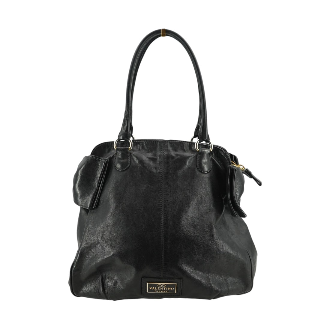 Valentino Garavani Leather Tote Bag Bows: Step back into the chic era of 2010-2019 with this exquisite Valentino Garavani Large Tote. A true gem for vintage lovers, this Italian-crafted shoulder bag is defined by its elegant side bow detailin