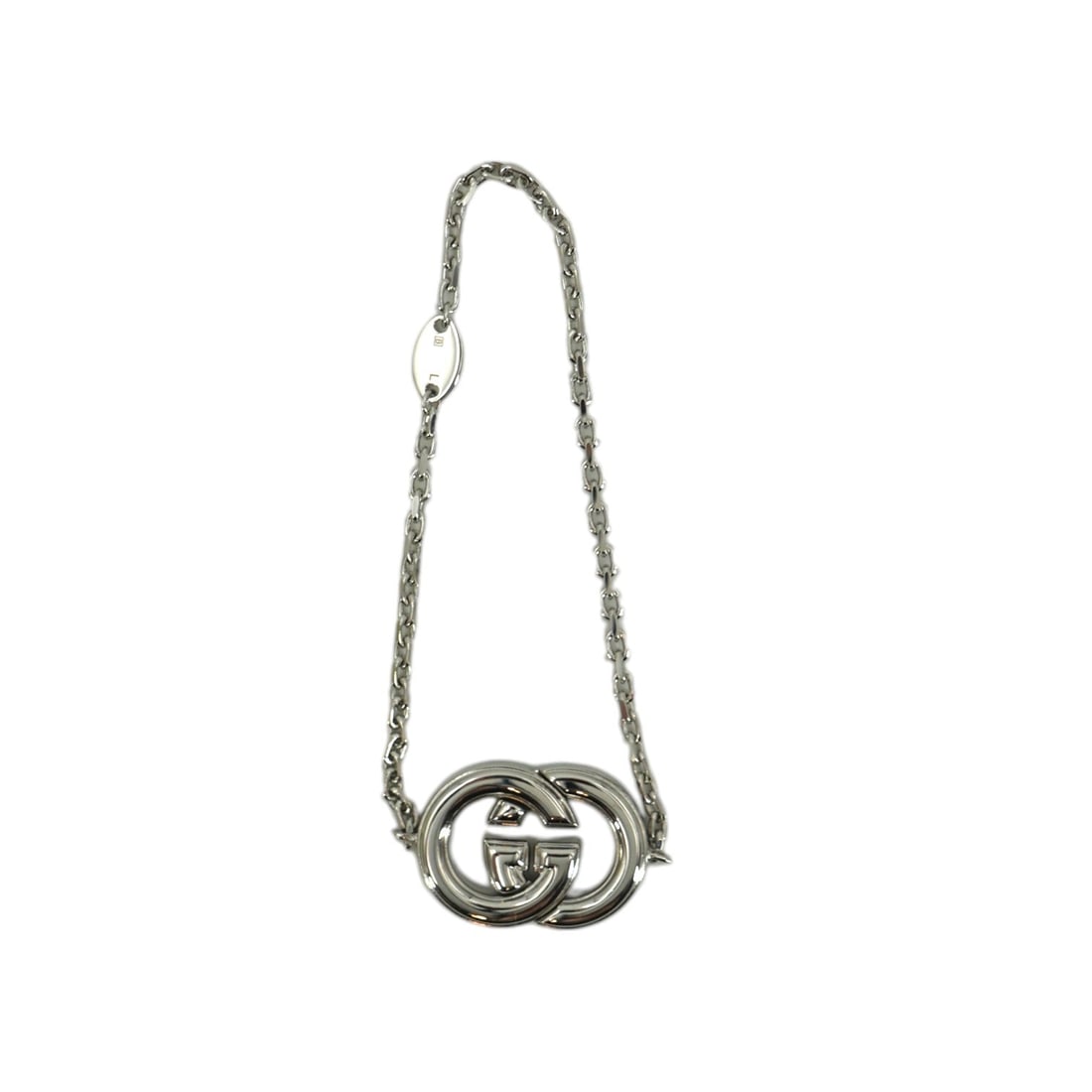 Gucci Metal Bracelet Interlocking: Discover modern Italian elegance with this Gucci Silver Metal GG Interlocking Bracelet, a sophisticated addition to any contemporary collection. Crafted in Italy from sleek silver metal, this women's 