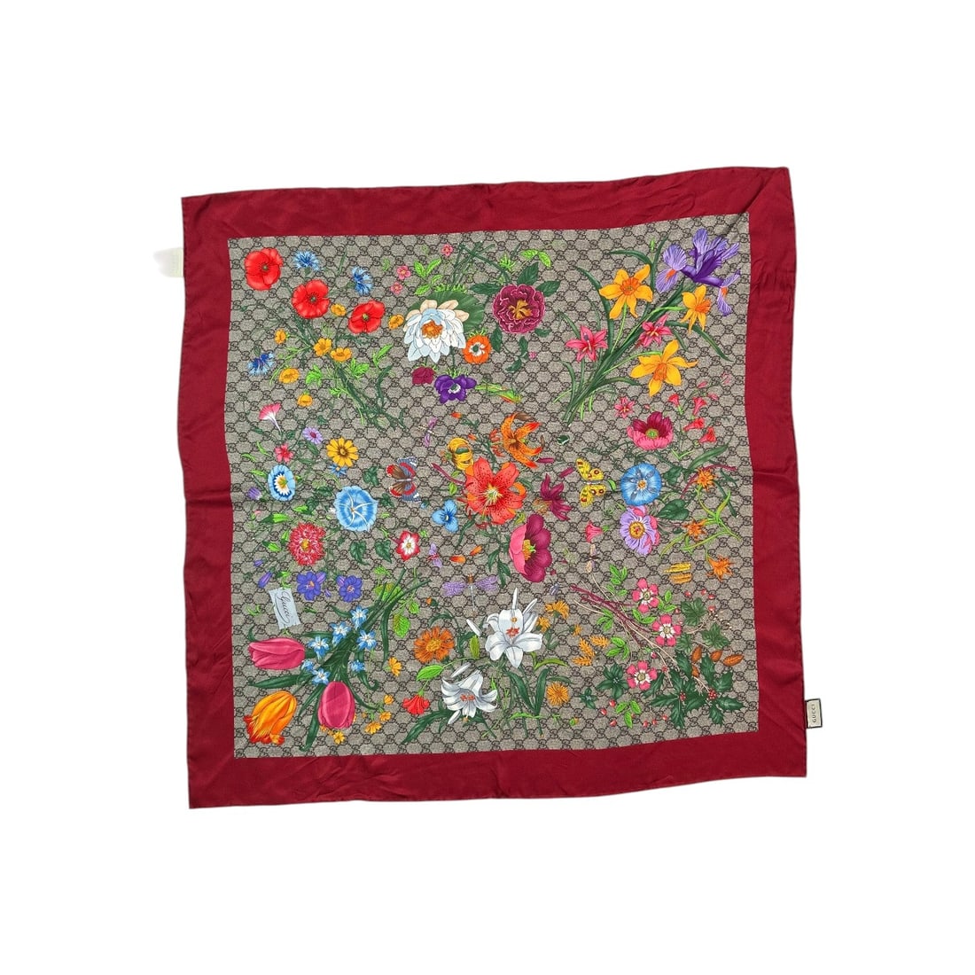 Gucci Silk Scarf Flora: Step into a world where archival elegance meets modern luxury with this stunning Gucci silk scarf. Crafted in Italy for a special collection released in 2020 or later, this piece beautifully marries t