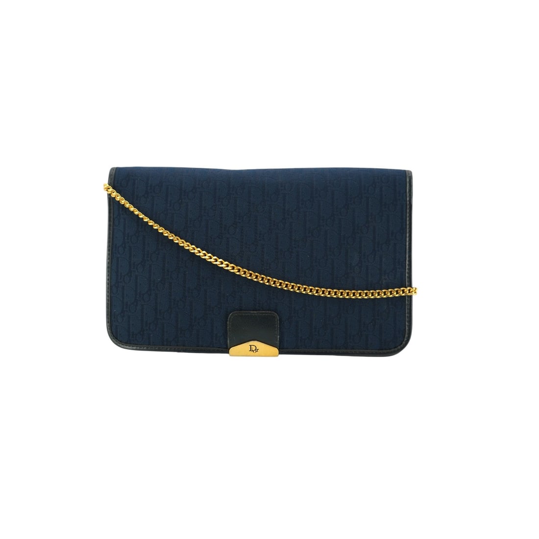 DIOR VINTAGE CLOTH SHOULDER BAG MONOGRAM: Transport yourself back to the sophisticated 1980s with this exquisite Christian Dior Vintage Navy Blue Logo Canvas Flap Shoulder Bag. Expertly crafted in France between 1980 and 1989, this small-size
