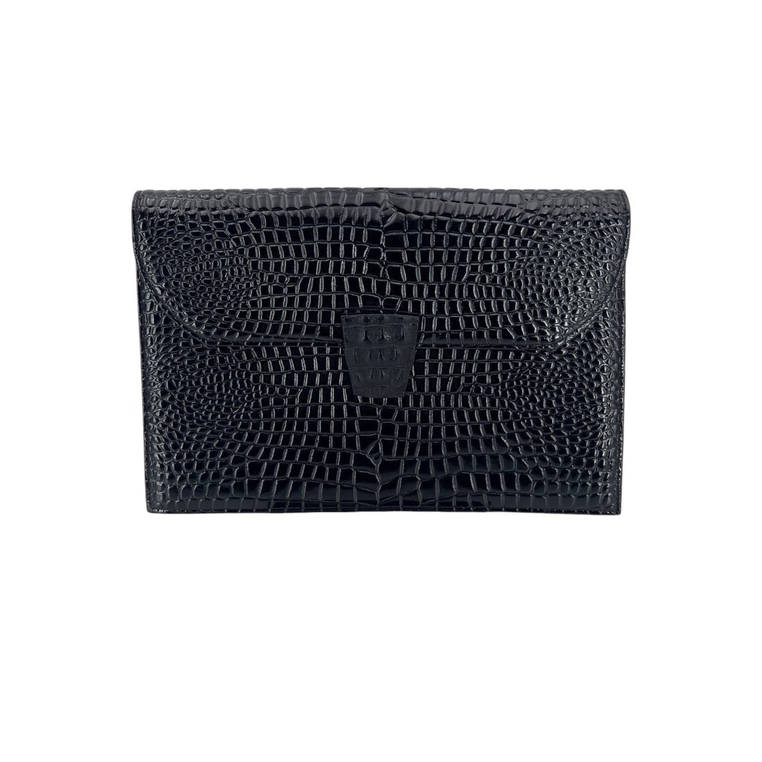 YVES SAINT LAURENT VINTAGE PATENT LEATHER CLUTCH BAG VINTAGE CLUTCH: Embrace the effortless elegance of the 1980s with this Yves Saint Laurent Vintage Clutch, a timeless piece that captures the essence of French luxury. Crafted in France between 1980 and 1989, this sma
