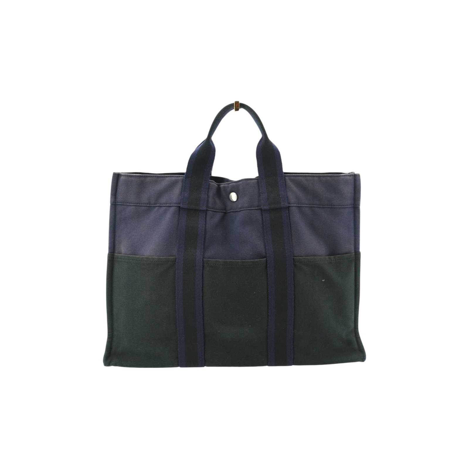 HERMES VINTAGE COTTON TOTE BAG FOURRE-TOUT: Experience the understated luxury of the 1980s with this Hermes Fourre-Tout MM, a piece that redefined the casual chic aesthetic of its era. This medium-sized tote, masterfully crafted in France, feat