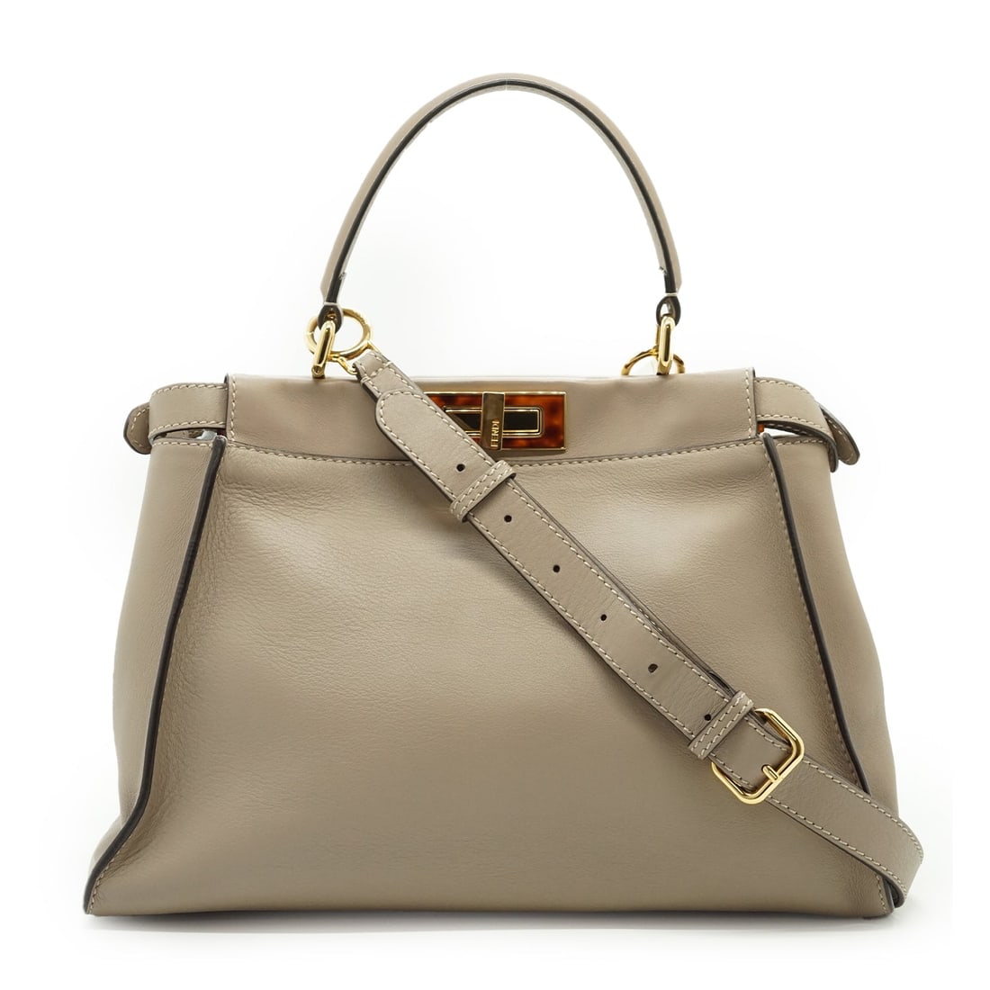 FENDI LEATHER HANDBAG PEEKABOO: Step into the world of timeless Italian luxury with this exquisite Fendi Peekaboo, a model that has become a true icon of the house since its release. Crafted in Italy between 2010 and 2019, this medi