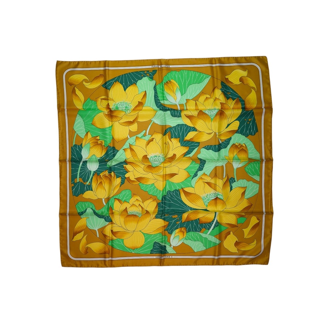 HERMES VINTAGE SILK SCARF CARRE 90: Transport yourself back to the elegant 1970s with this exquisite Hermes "Fleurs de Lotus" silk scarf, a true treasure for any vintage connoisseur. Designed by the legendary Christiane Vauzelles and me