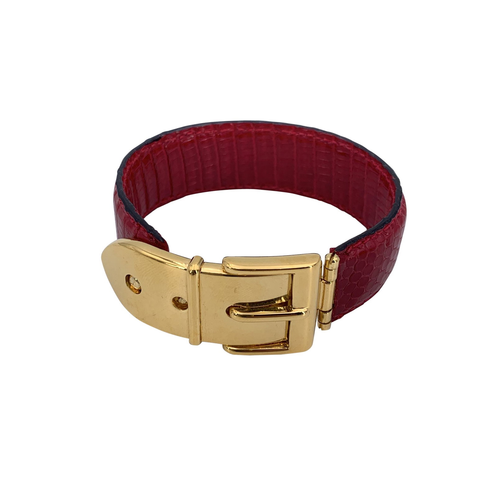 GUCCI VINTAGE METAL BRACELET: Vintage beautiful cuff bracelet by Gucci. Made in red leather, it features an gold metal buckle. Will fit up to approx. 6.5 inches - 16.5 cm wrist.Width: 0.75 inches - 2 cm. 'Gucci - made in Italy' en