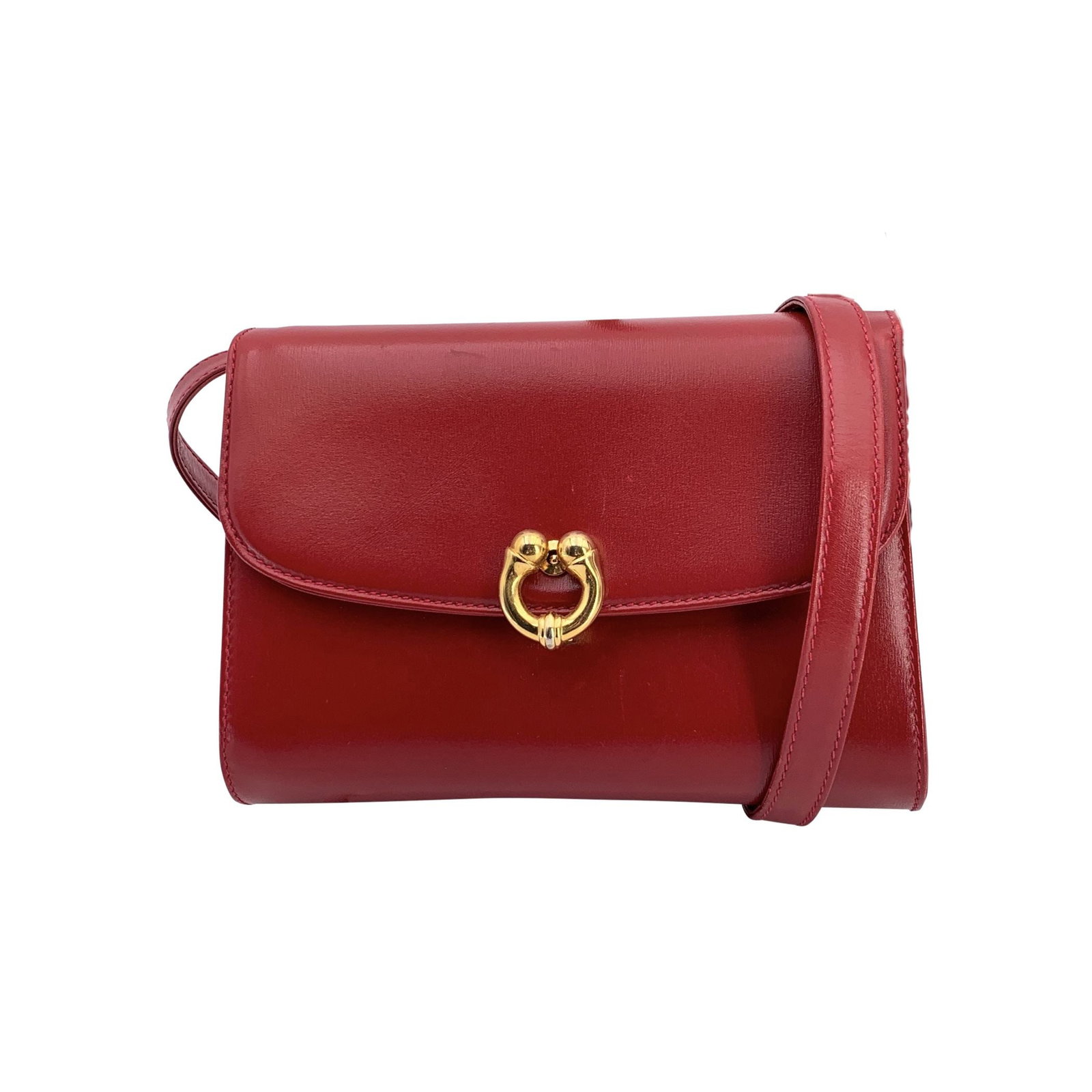 GUCCI VINTAGE LEATHER CROSSBODY BAG: Step out in classic vintage style with this Gucci Vintage Red Leather Gold Push Lock Messenger Crossbody Bag, crafted in Italy during the vibrant 1990s. This small-sized bag perfectly captures Gucci's