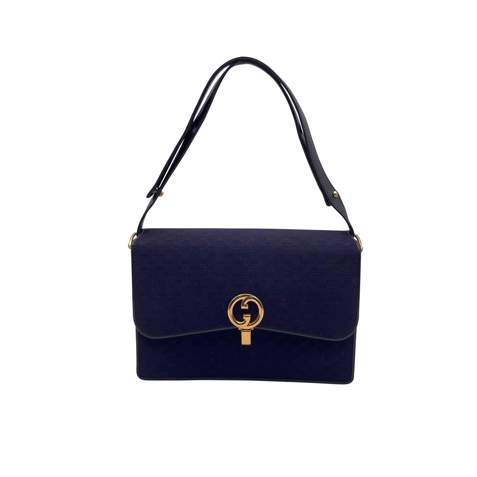 GUCCI VINTAGE CLOTH SHOULDER BAG: Step into the elegance of the 1980s with this Gucci Vintage Blue Micro GG Monogram Canvas Handbag Shoulder Bag. Made in Italy, this medium-sized shoulder bag features the iconic micro GG pattern in bl