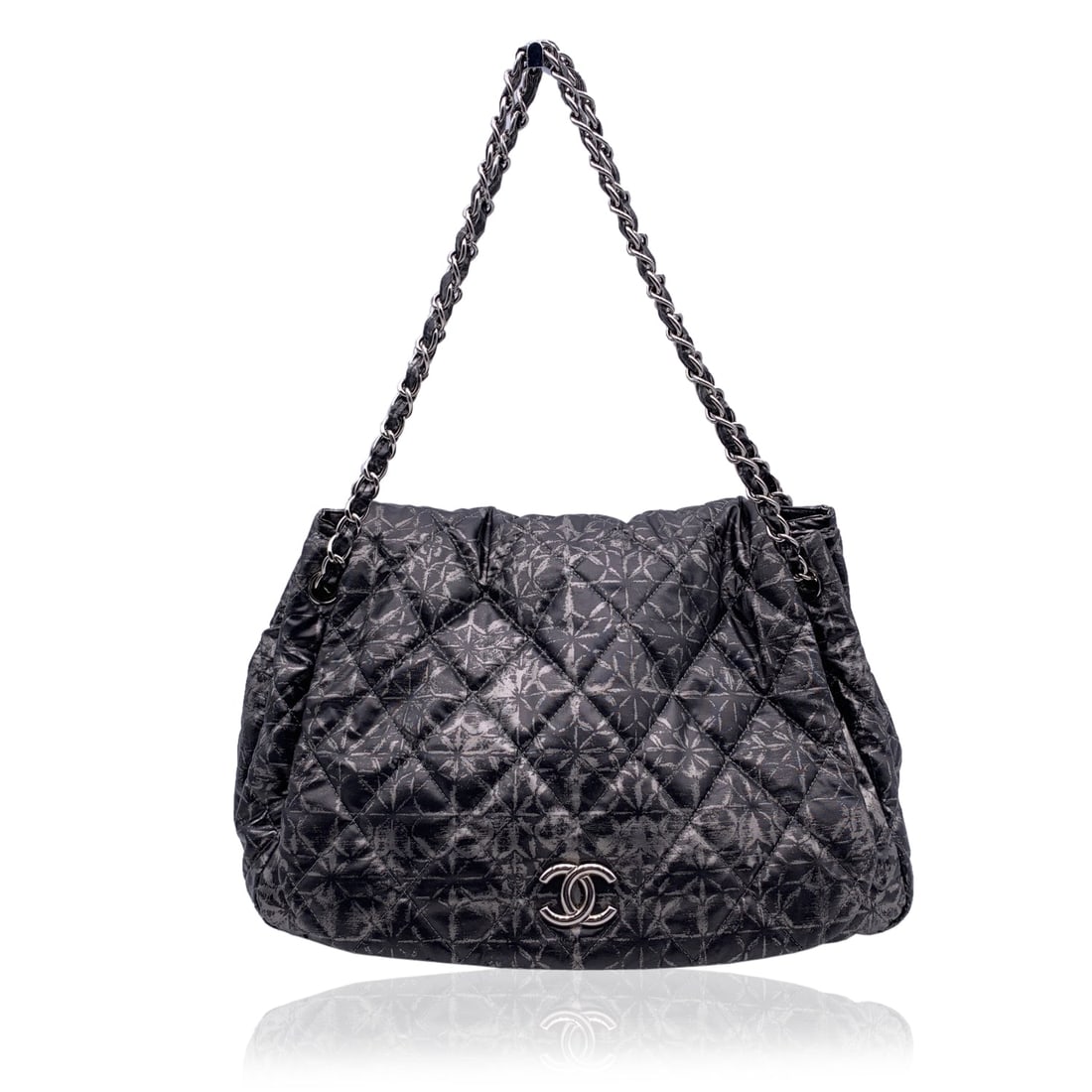 CHANEL CLOTH SHOULDER BAG TIMELESS/CLASSIQUE: A striking and collectible piece from Chanel, the 'Rock in Moscow' Accordion Flap Bag is crafted from metallic grey padded nylon featuring an abstract quilted pattern that gives it a modern, edgy
