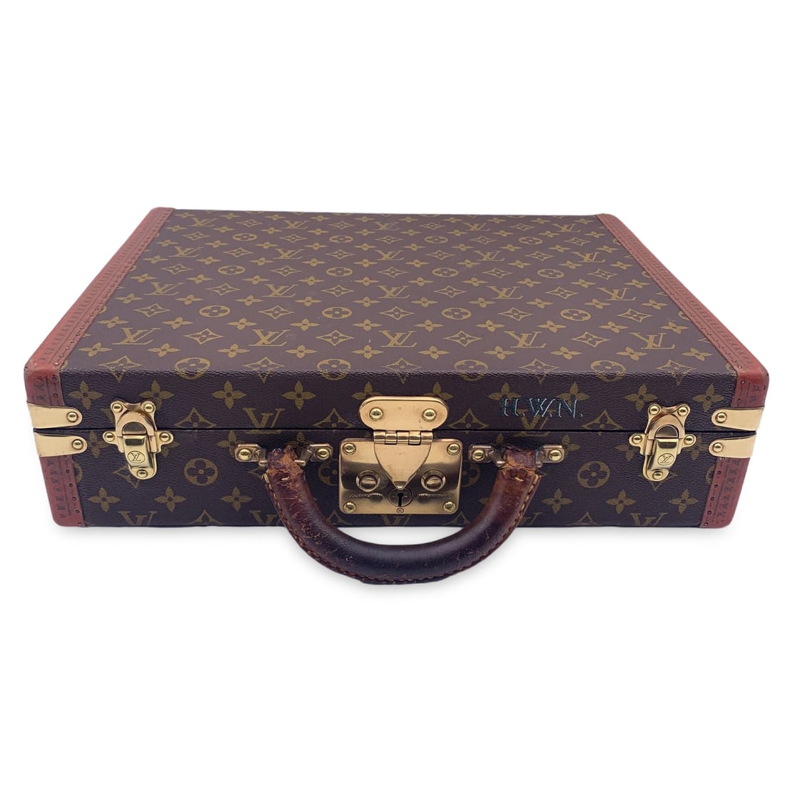 LOUIS VUITTON VINTAGE CLOTH BRIEFCASE PRESIDENT: This gorgeous vintage Louis Vuitton "President" hard-side briefcase is a true collector's item, a symbol of both luxury and functionality that only gets better with age. Crafted from the iconic monogr