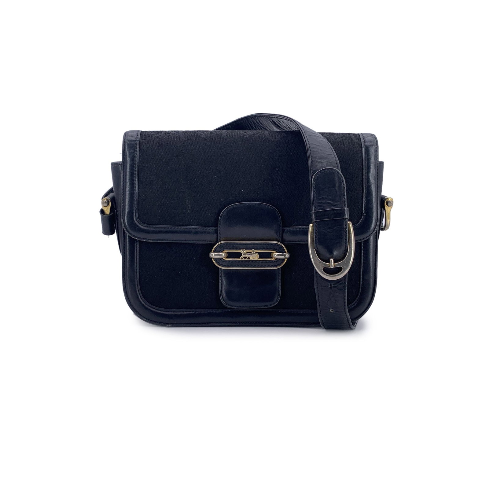 CELINE VINTAGE CLOTH SHOULDER BAG C CARRIAGE: Step into the understated luxury of a bygone era with this vintage Celine Horse C Carriage box shoulder bag. A true treasure from the 1980s, this Italian-made piece is crafted in classic black Macadam