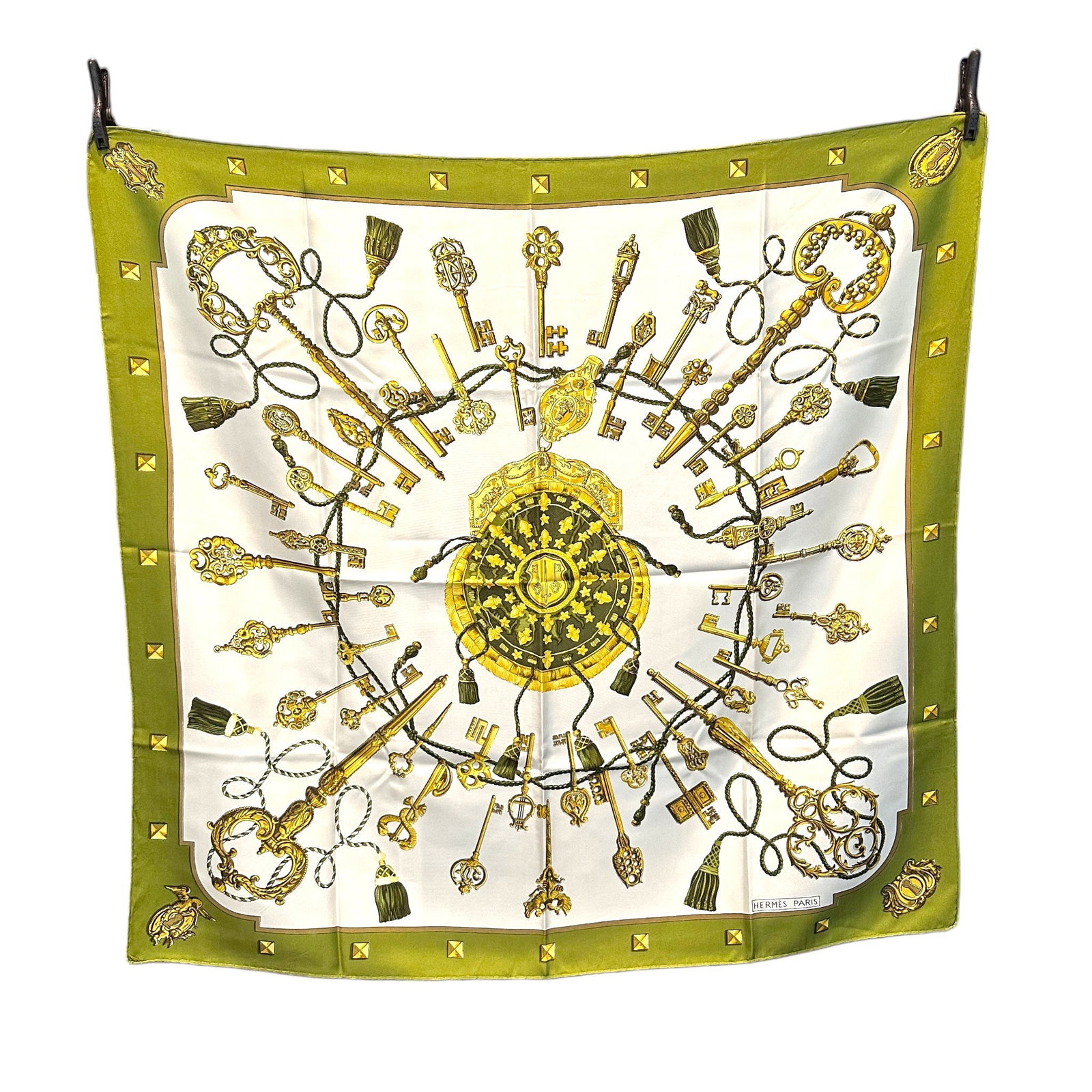 HERMES VINTAGE SILK SCARF CARRE 90: Step into the golden era of Hermes with this exquisite Carre 90 silk scarf, a true testament to French craftsmanship from the past. Designed by the iconic artist Cathy Latham and introduced in 1965, t