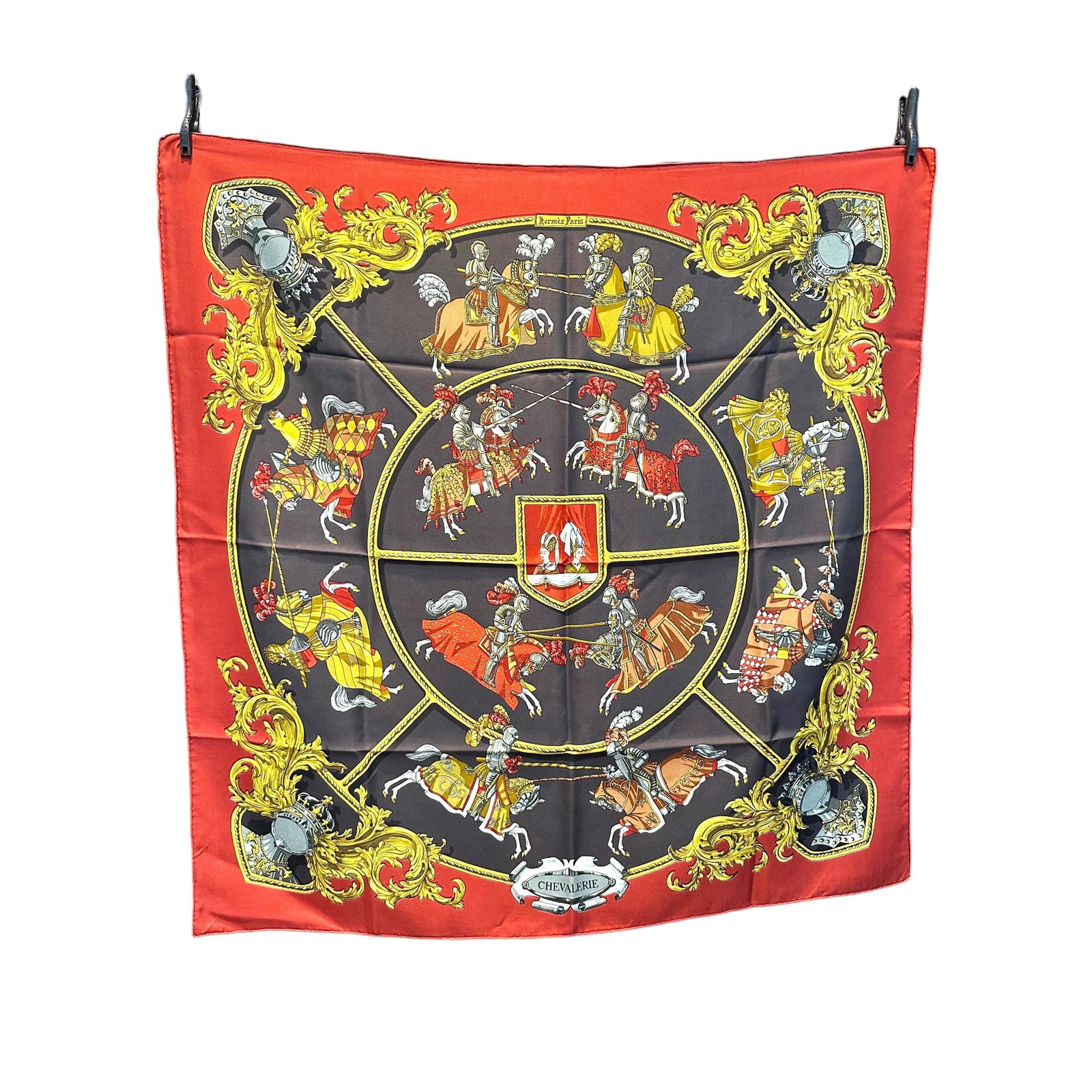 HERMES VINTAGE SILK SCARF CARRE 90: Immerse yourself in the world of vintage luxury with the iconic Hermes Carre 90, a true testament to French craftsmanship from the 1960s. Designed by the celebrated Cathy Latham, this exquisite silk s