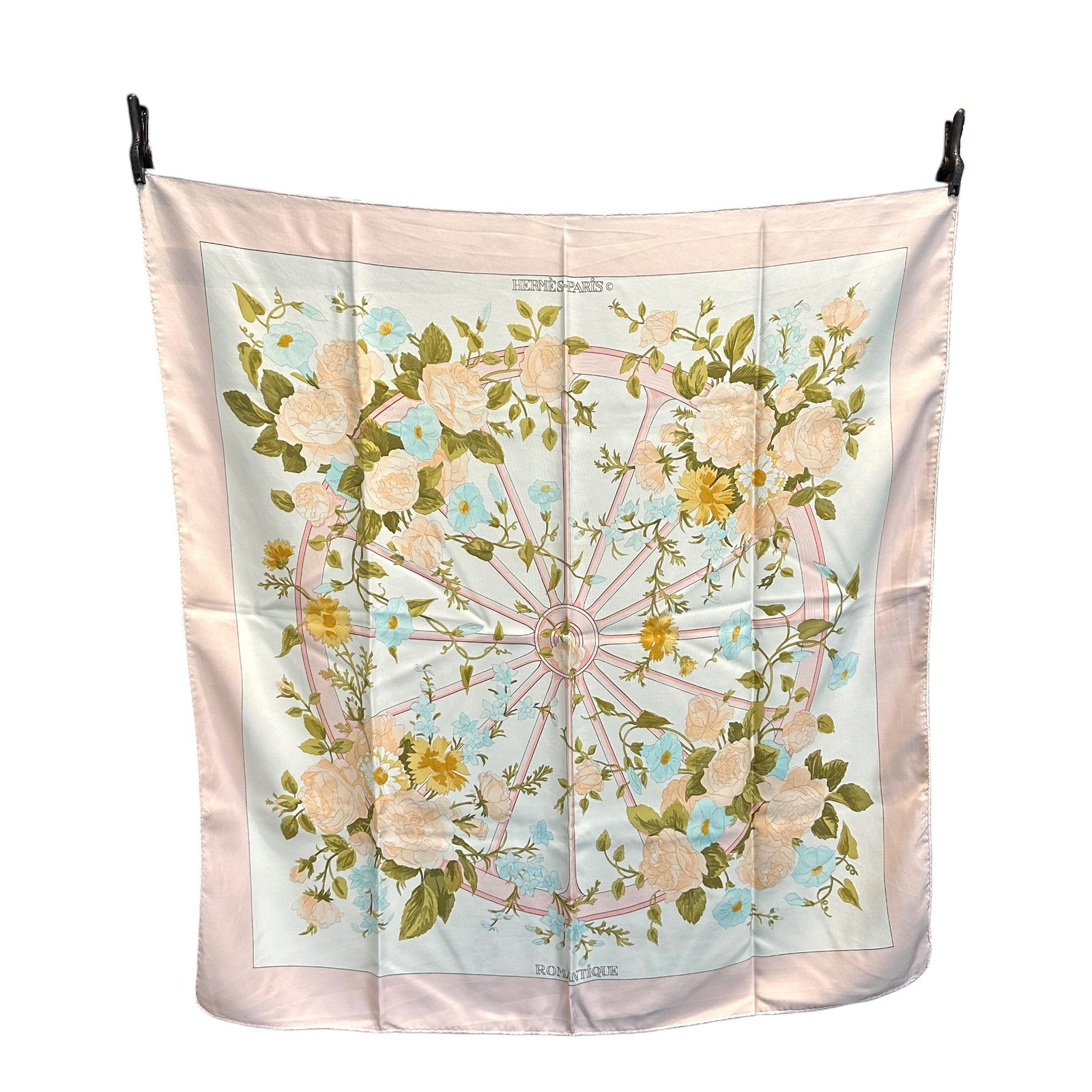 HERMES VINTAGE SILK SCARF CARRE 90: Step into a world of timeless elegance with the Hermes Carre 90, a vintage treasure that captures the romantic spirit of the 1980s. This exquisite silk scarf, designed by the renowned Maurice Tranchan