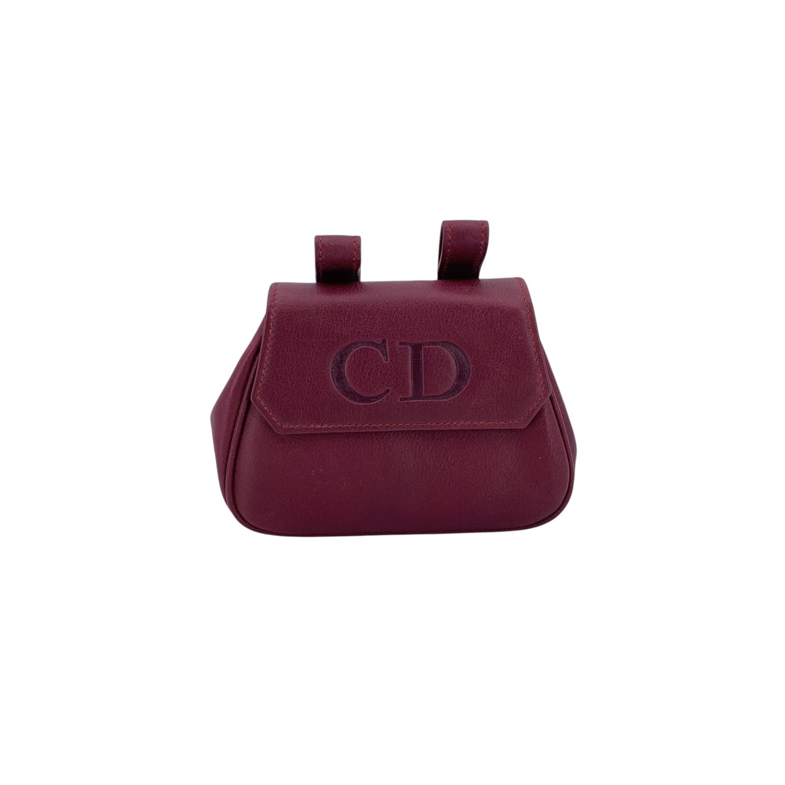 DIOR VINTAGE LEATHER SHOULDER BAG MONTAIGNE: Minimal, elegant, and unmistakably Dior, this vintage Christian Dior CD Montaigne belt pouch mini bag is a refined accessory designed for light, effortless carrying. Crafted from super-soft burgundy l