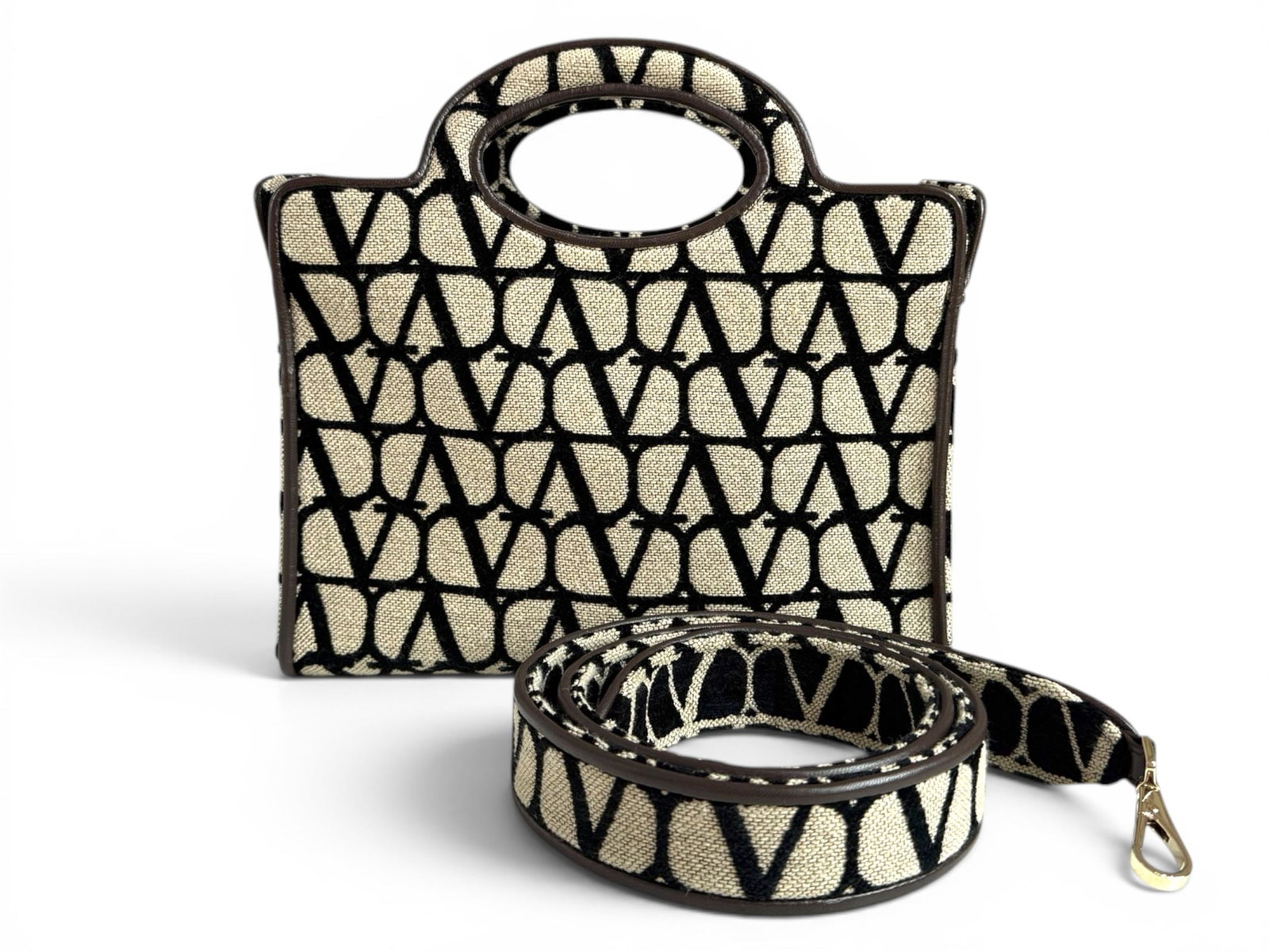 Valentino Le Troisieme Canvas Shoulder Bag and Crossbody, Iconic Toile Design: The Valentino Le Troisieme showcases the distinctive Toile Iconographe pattern in a stylish and versatile canvas design. Elegant and contemporary, this bag is a standout accessory that effortlessly el