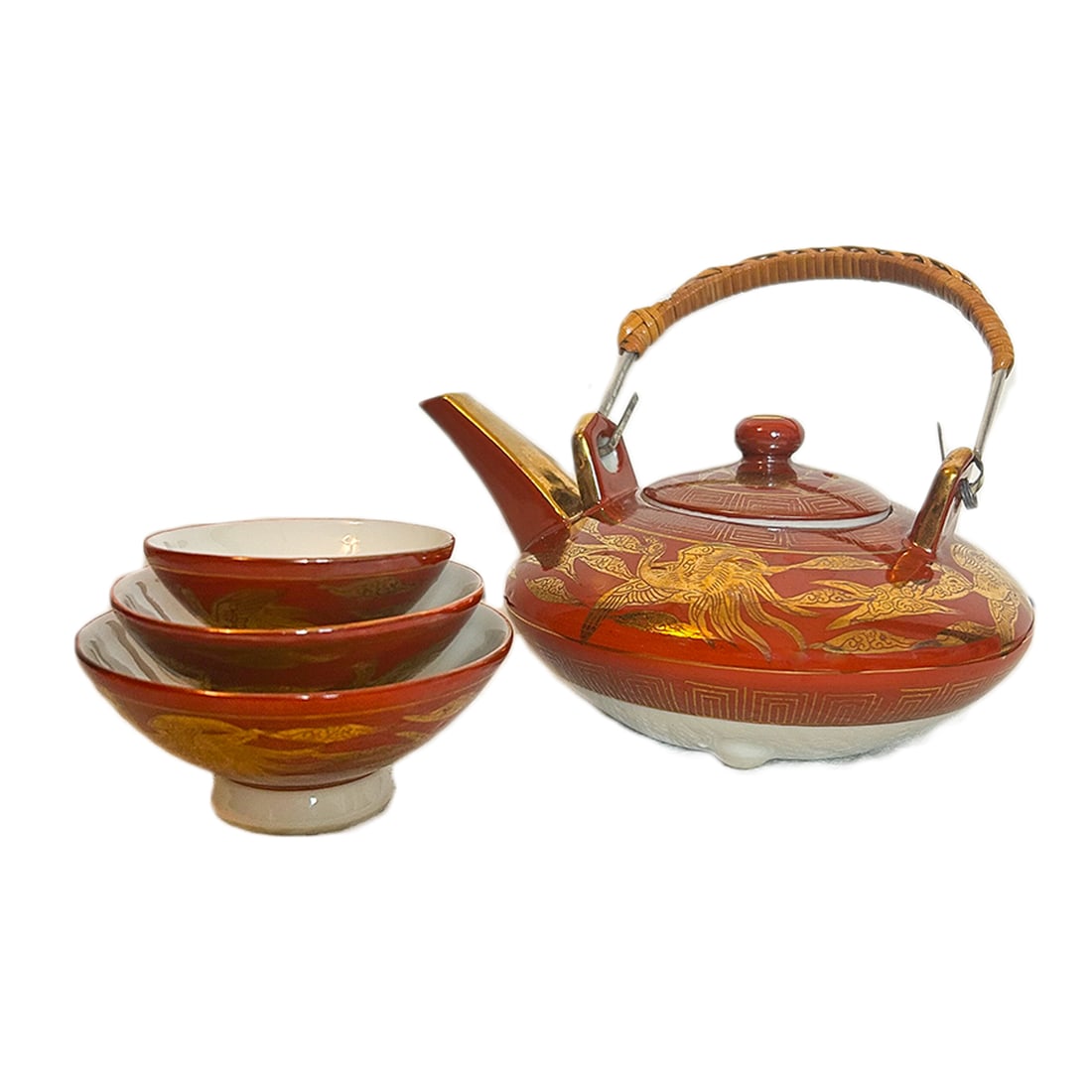 Red and Gold Tea Pot and Tea Cups: Stunning red Japanese tea set adorned with radiant gold detailing. Set includes one teapot, four small tea cups, and three small bowls. A graceful addition to your tea ceremony or home display.