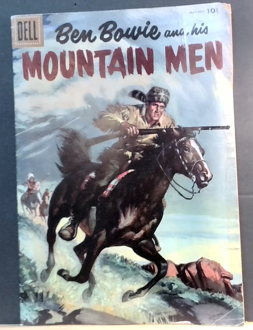 Ben Bowie and His Mountain Men Indian Painted cover 1956 Dell comic Golden age: All comics bagged and boarded. G-VG+ Please note we are not comic book graders. Please inspect picture(s). Many other comic books being added daily to our sale.