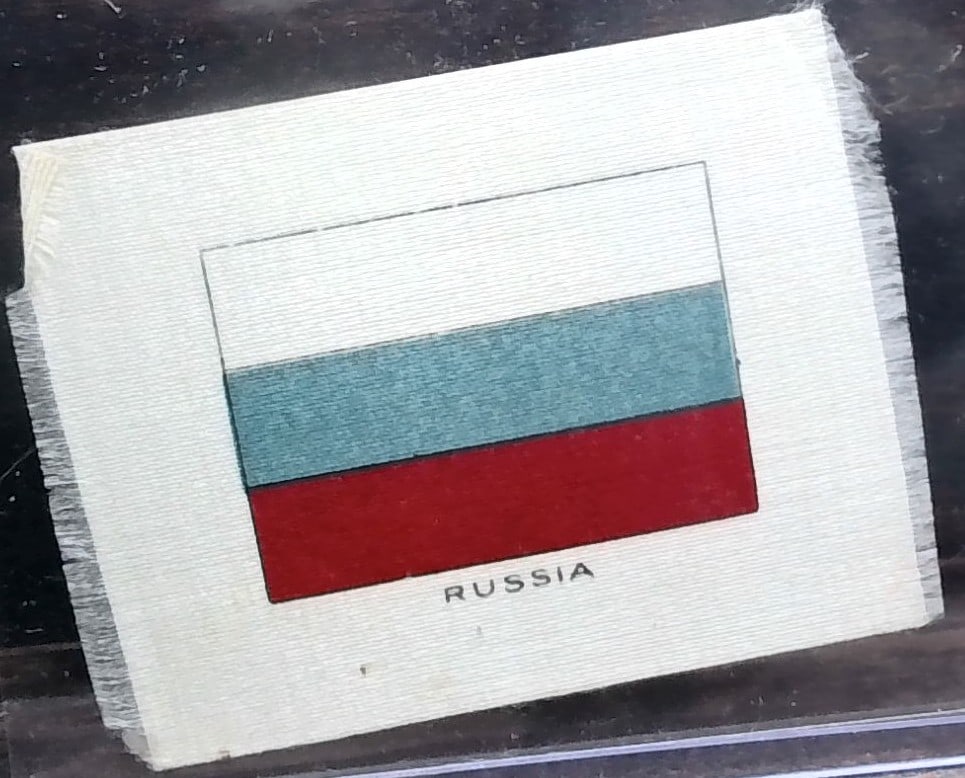 1912 German Tobacco card - Russia Flag Silk: with some rear card surface wear, Many Tobacco cards and silks available. Consistently adding new items daily to our Auction. Please keep checking back for new arrivals. Please note any white specks i
