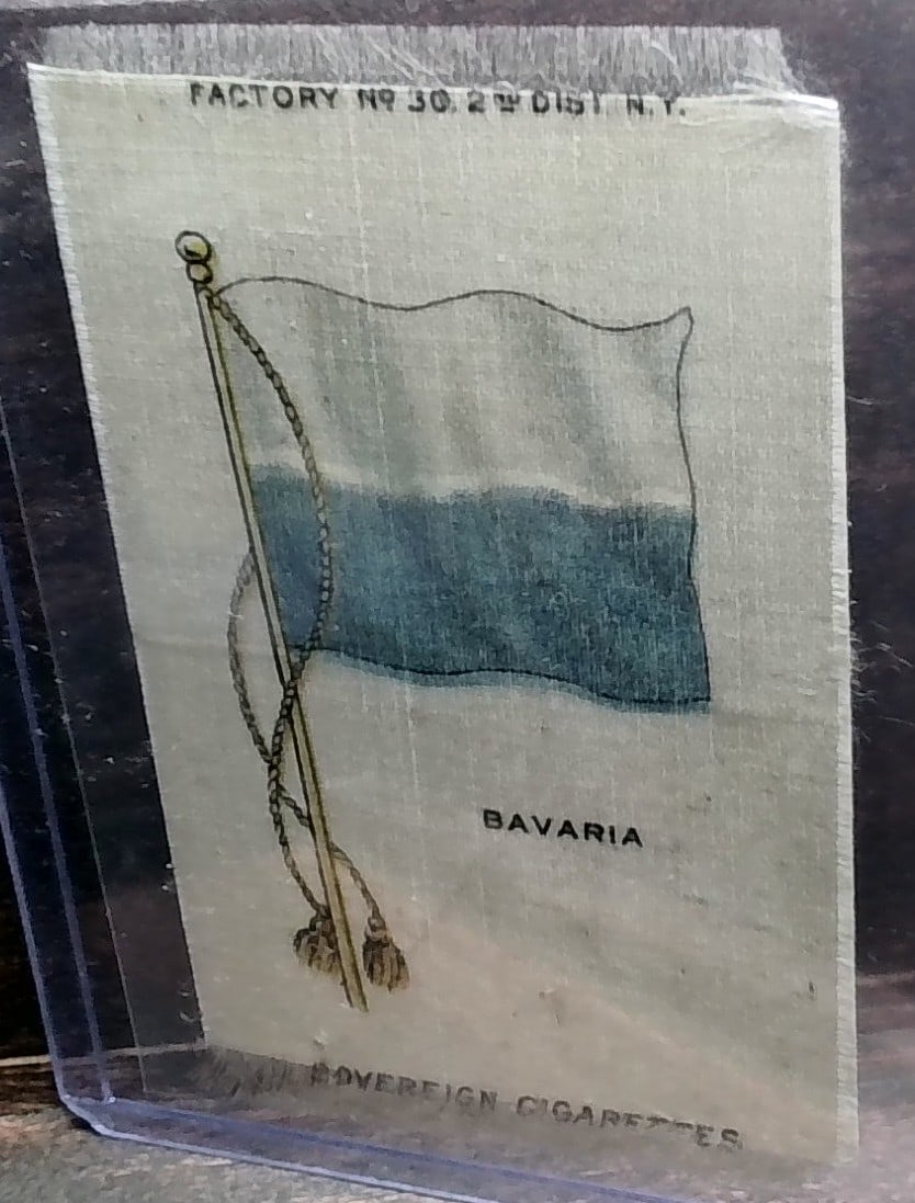 1912 German Tobacco card - Bavaria Flag Silk: with some rear card surface wear, Many Tobacco cards and silks available. Consistently adding new items daily to our Auction. Please keep checking back for new arrivals. Please note any white specks i