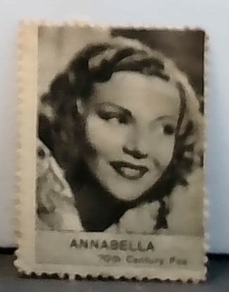 Early 1930s Tobacco Cinema Stamp Annabella 20th Century Fox VG: A scarce Beautiful hand cut original stamp in top loader with penny sleave, VG, Please inspect pictures.