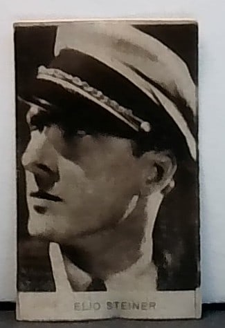 1930s Elio Steiner Italian Cinema Ivlas Chocolate Card Hand Cut: A scarce Beautiful original hand cut card, in top loader and penny sleave, VG, Please inspect pictures.