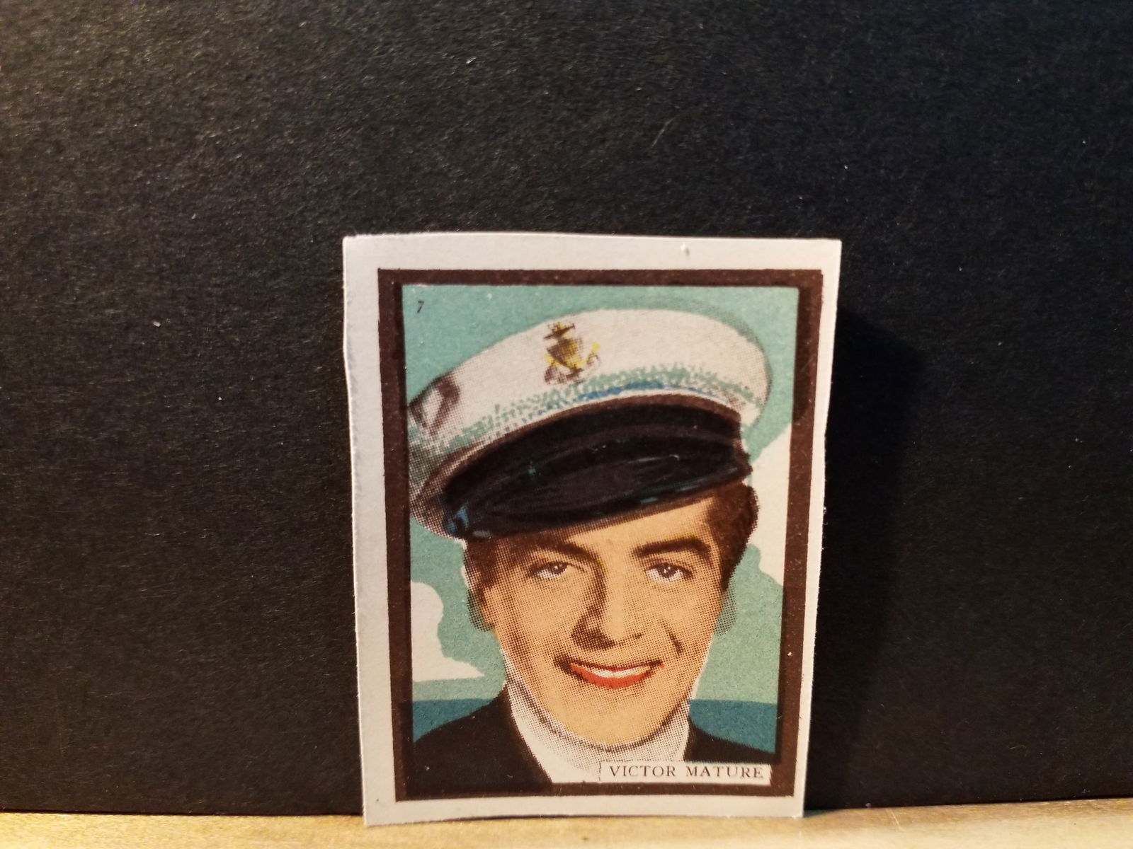 Victor Mature 1930s Chocolate color Cinema film strip card: Original Hand Cut card, original, More items being added daily. Please view pictures.