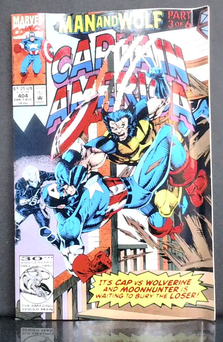 Captain America #404 Man and Wolf Part 3 of 6! 1992 Marvel Comics NM-MNT: In super condition. All Comics come bagged and boarded, Please view pictures. Comic books being added daily to this current sale. Please check back often. We Gladly Combine multiple winnings for shipm