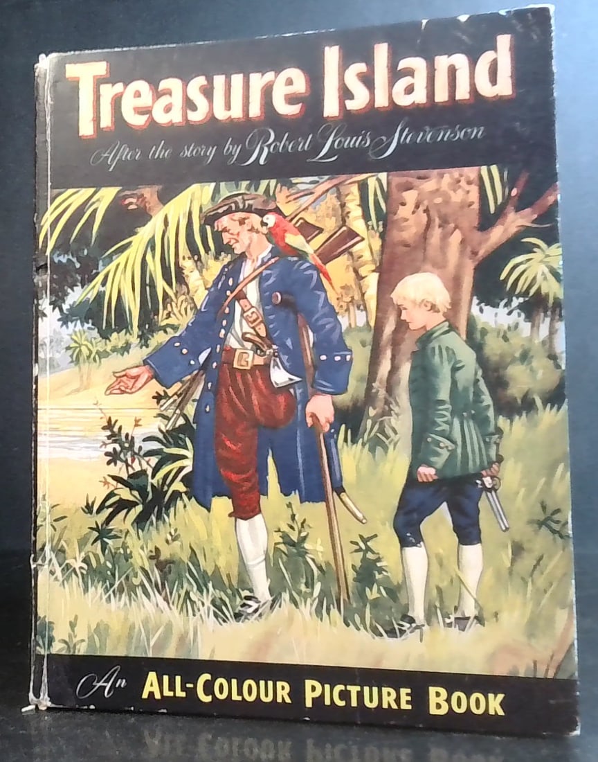 Vintage Treasure Island all colour Picture book By Robert Louis Stevenson: Published by Ward Locke and Co. Illustrated , front board just slighly warped but in good condition overall, beautifully illustrated boards and pages.