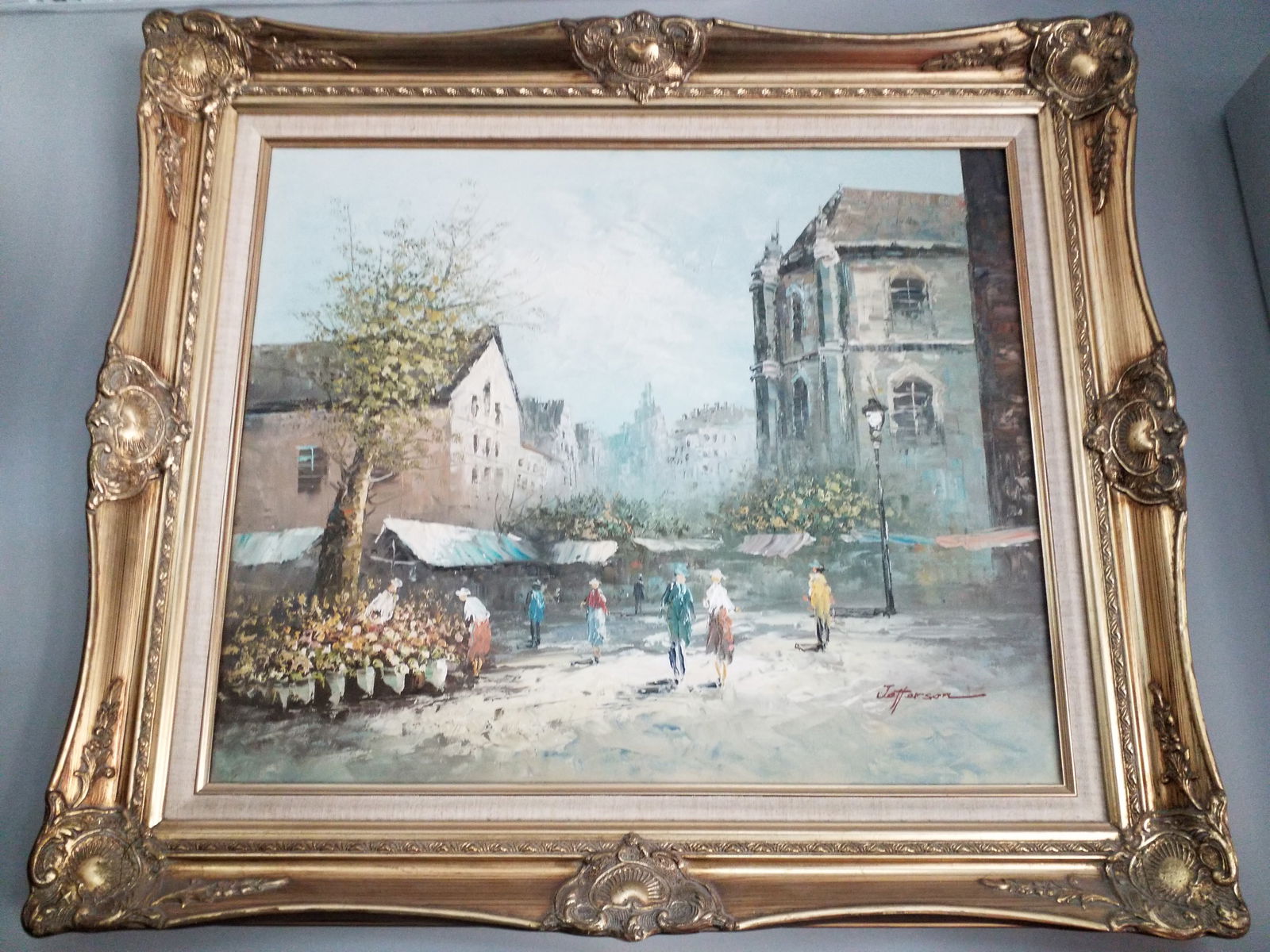 Signed Gilded Time Period Frame Oil Painting on Canvas Village Scene Flower Merchant by Jefferson: Signed in lower right Corner by Artist Jefferson. Beautiful Village Scene , Scarce, In original beautiful Gilded Gauty time period Frame. Original Oil Painting. Stunning. Frame Measure 30X26, painting