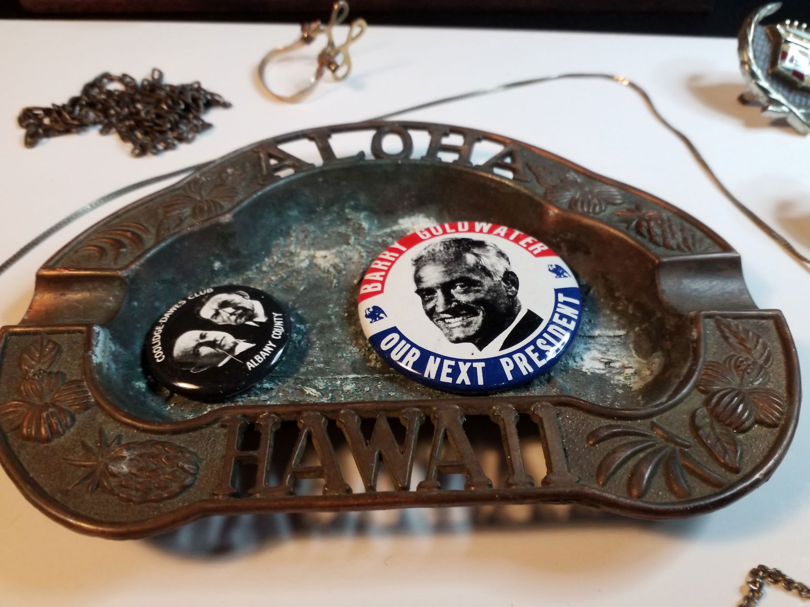 A large collection of Jewelry Rings Necklaces early buttons Auto Emblems Brass ash tray: A large collection of Jewelry Rings Necklaces early buttons Auto Emblems Brass ash trayin Good condition, track piece not included. please view photos.