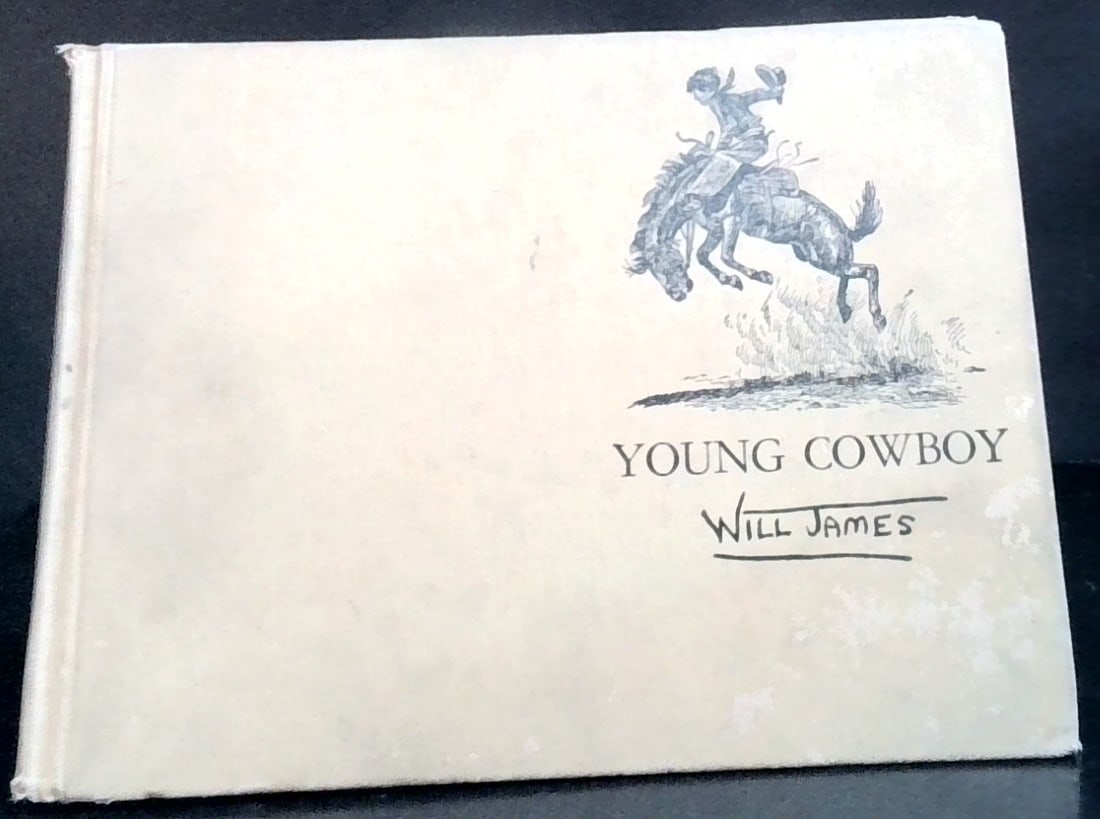 Young Cowboy by Will James with Drawings 1948: Published by Charles Scribners 1948 , 2nd edition, nicely illustrated, with edge wear, and some marks, intact, ,,hardcover, illustrated, overall nice.