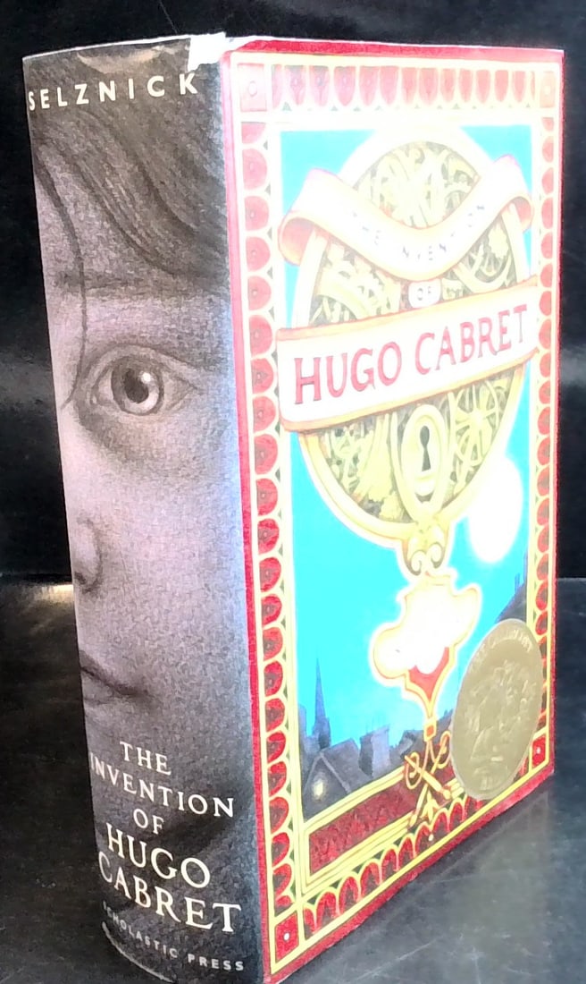 2007 Invention of Hugo Cabret in jacket incredible illustrations: Published by Scholastic Selznick, Brian (illustrator). First edition and first printing. Hardcover. National Book Award finalist and Caldecott winning children's book. A striking book with numerous il