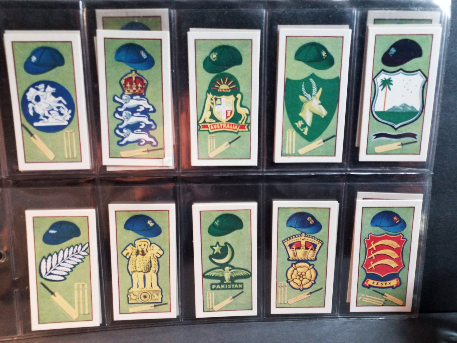 1956 Kane Products CBT Cricket Clubs and Badges Original Tobacco cards Set: original Complete sheeted set. In protector tobacco cards sheets. In very good condition, Please view pictures below. Many More sets being added to this our current sale.