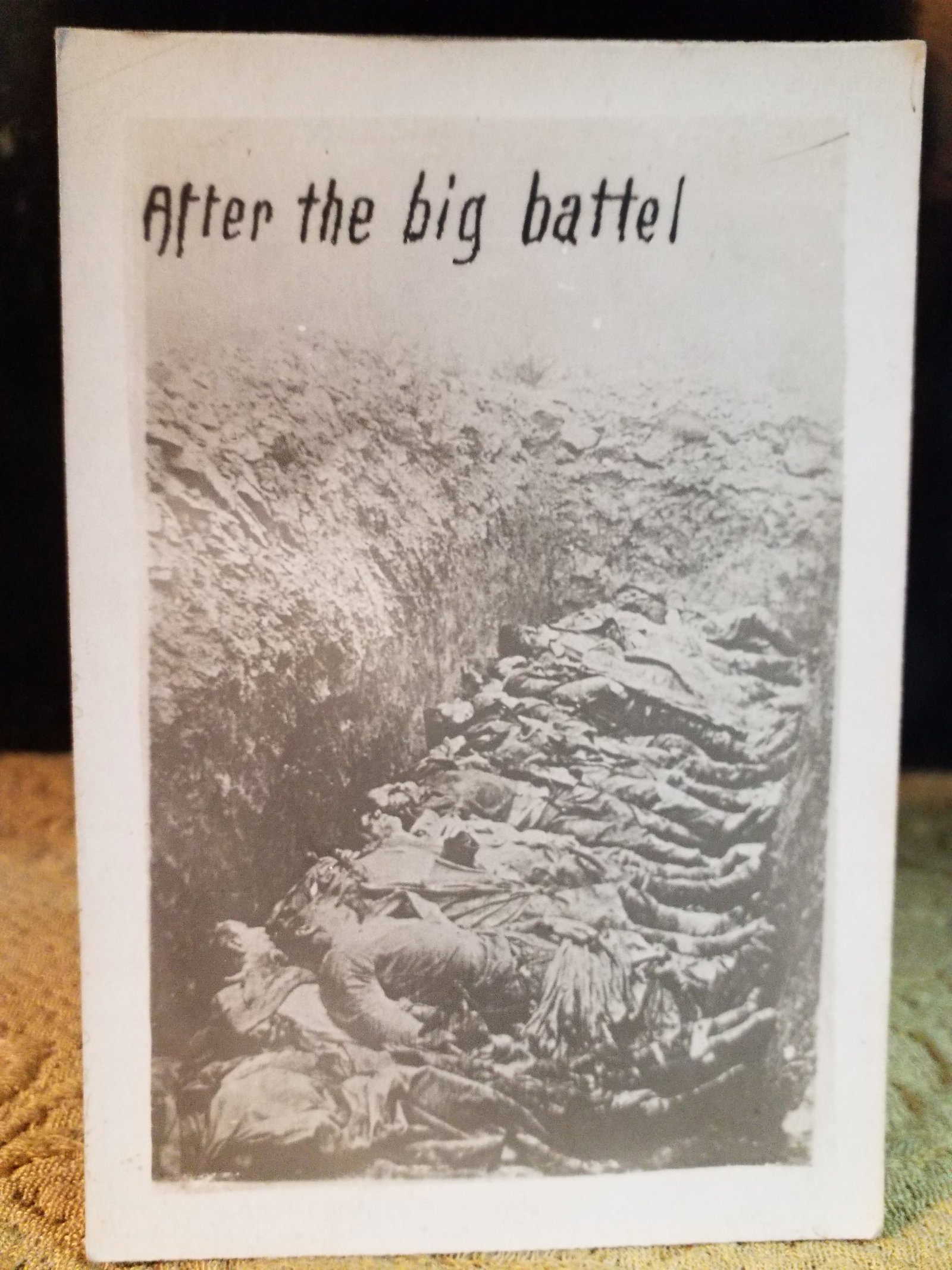 Original WWI RPPC Real Photo Postcard Tragic Mass Grave of After battle of Dead Soldiers (1 of 2)