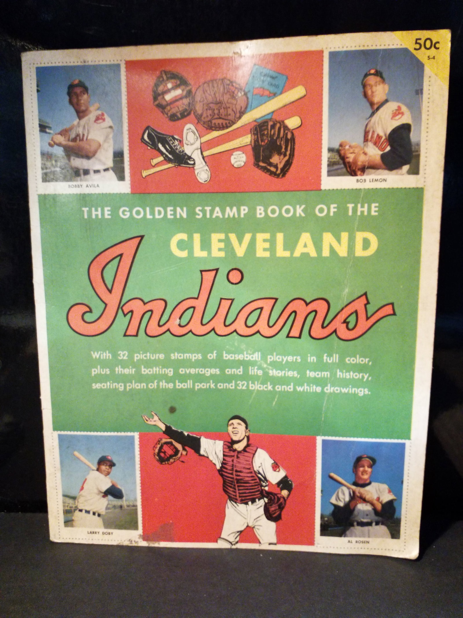 1955 edition of The Golden Stamp Book of the Cleveland Indians Complete 32 Stamps set Bob Feller etc: OVerall in pretty good condition, solid book, with a few short tears to a few pages, but still overall good, All 32 Baseball players stamps present. Used and affixed in album. Content: The album origi