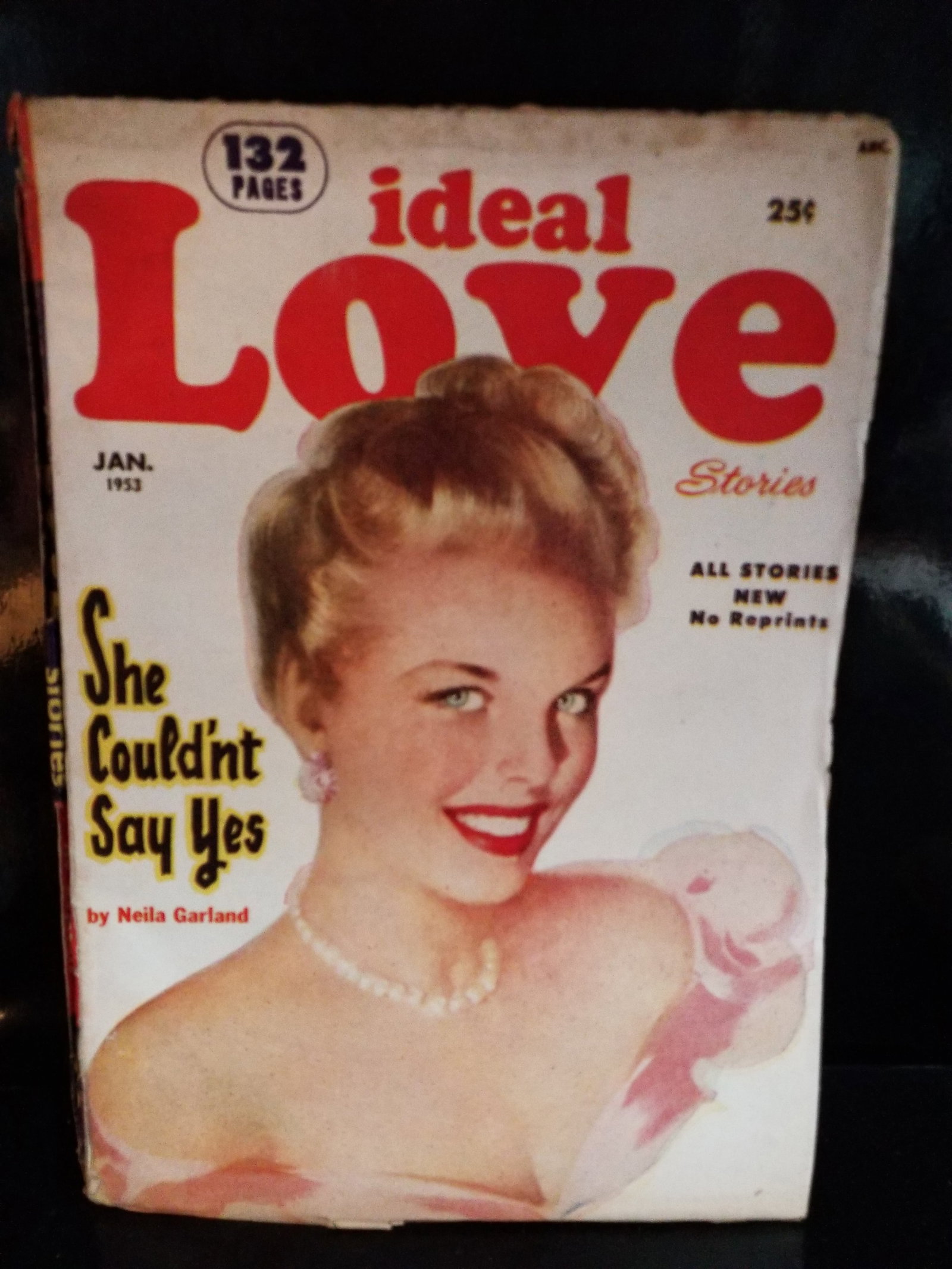 Jan. 1953 Ideal Love Romance Pulp Comic book She Couldn't Say Yes by Neila Garland VG+/F: strong intact binding with some wear to the corners, but complete and intact, this pulp is doing very well.Cover Story: "She Couldn't Say Yes" written by Neila Garland.Features: The issue contains 132