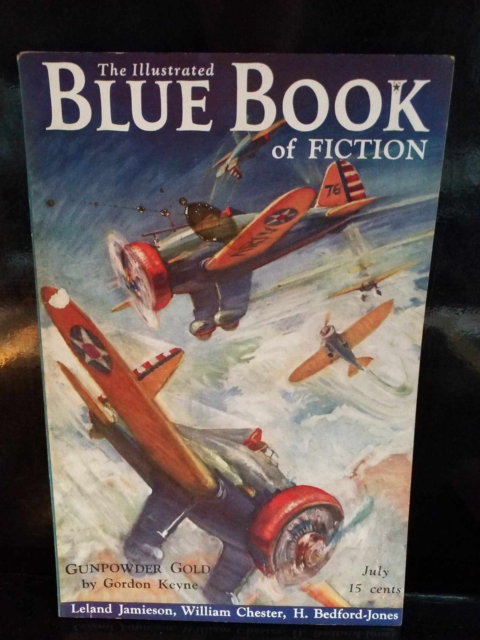 Golden Age Pulp Blue Book July 1937 Gunpowder Gold by Gordon Keyne F+-VF+: The Illustrated Blue Book of Fiction , pulpIn Exceptional Condition, Original Golden Age Pulp Cover Art: Painted by prominent illustrator Herbert Morton Stoops, depicting an aerial dogfight involving 