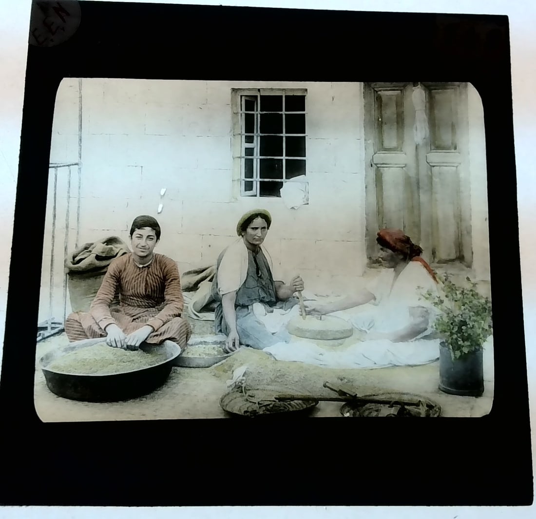 Woman of the Holy Land Sifting Grain 1880s-Early 1900s colored Magic Lantern Slide (1 of 1)