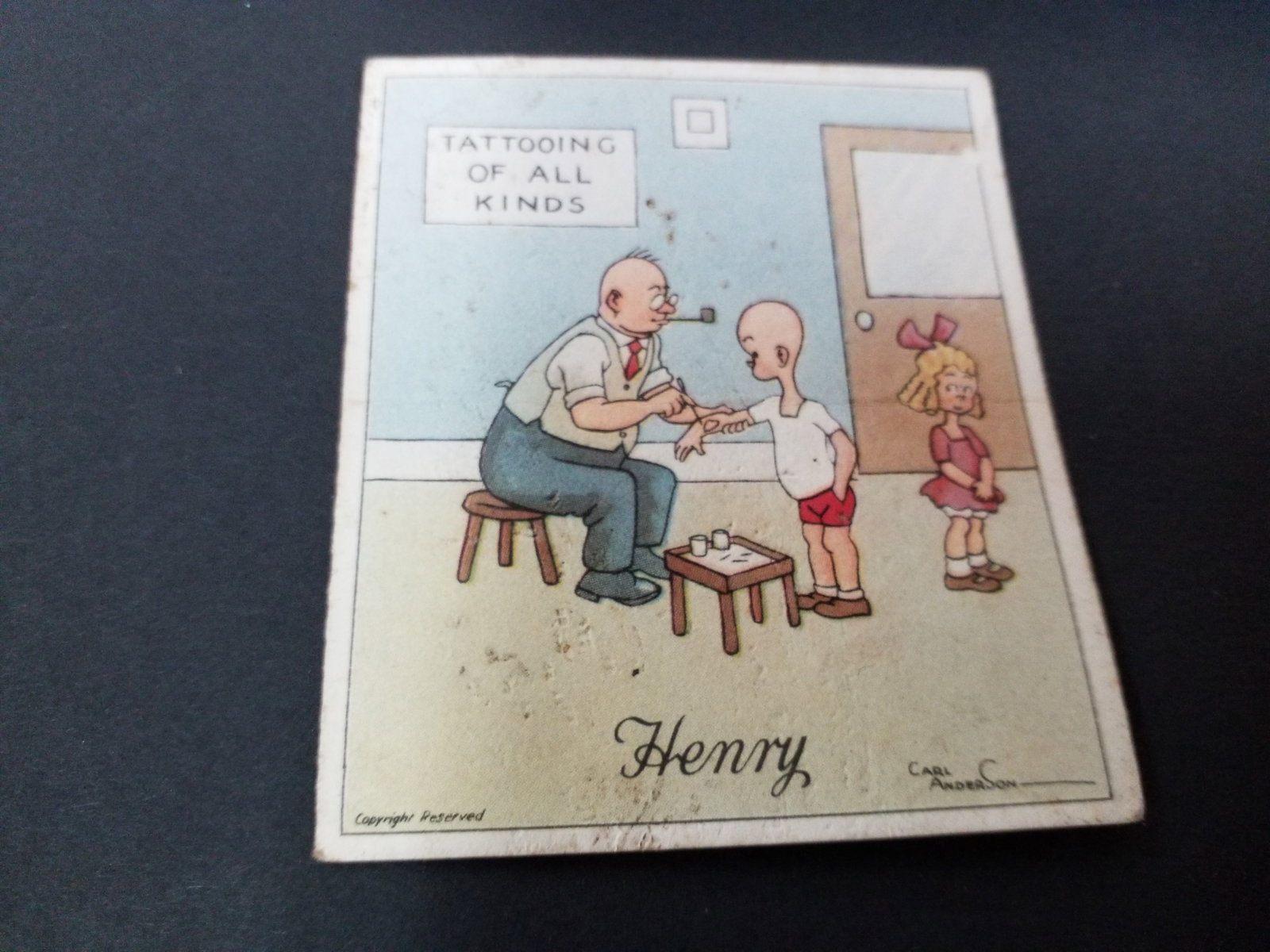 1935 Henry Humorous tobacco Comic Card J Wix & Sons LTD Tatooing of All kinds: Original COMIC strip artwork Henry CARD SIZE 3 1/8 x 2 5/8 INCHES!TOBACCO CARD IS IN ONLY GOOD , creased in middle as the majority of Henry Cards were. These are original cigarette cards most predate 