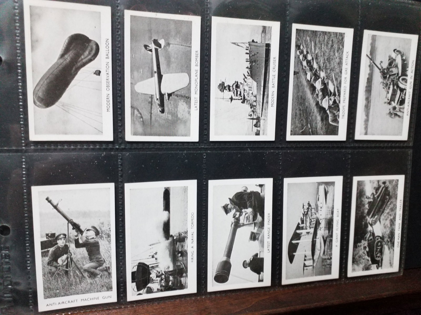 Tobacco cards 1938 LOUIS GERARD LTD. MODERN ARMAMENTS 50 DIFFERENT Cigarette CARD SET: Original Complete Sheeted Protected Set. In Very Good condition. Many other tobacco cards sets and collections available.