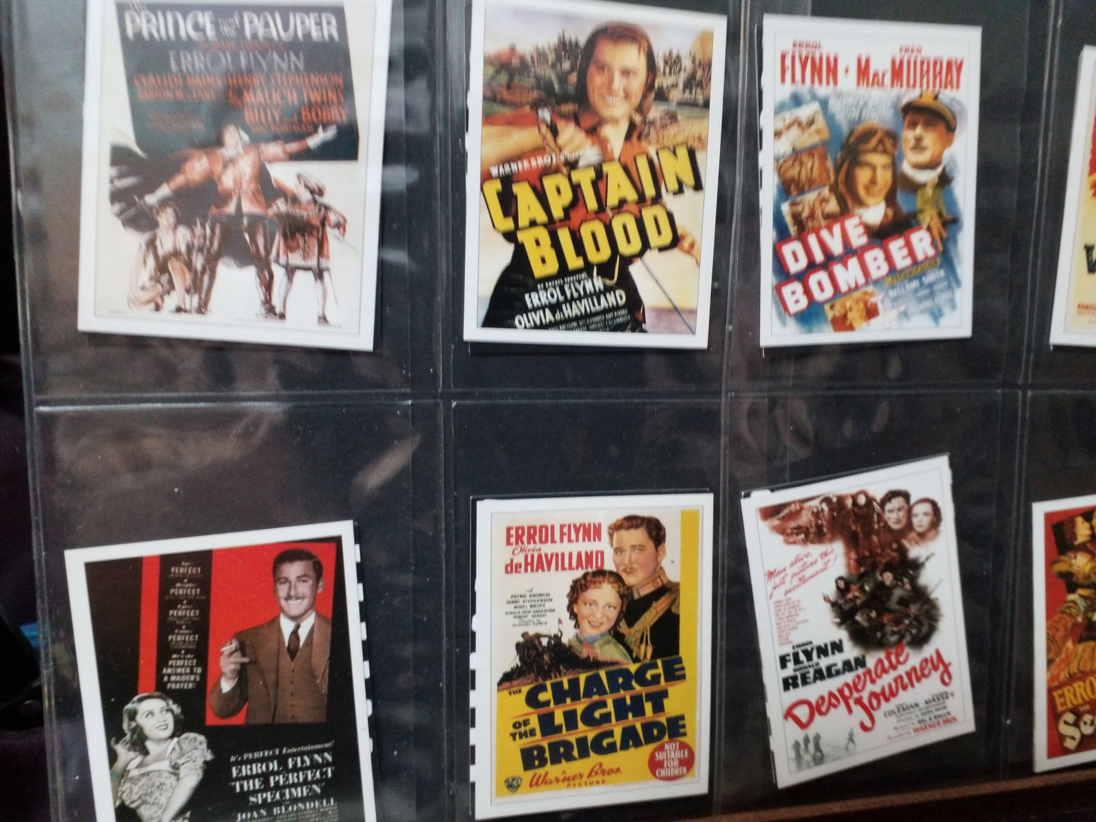 Sporting Profiles - Movie Idols Errol Flynn 2004 - Mint Condition 30 cards set Captain Blood: Set of 30 cards of - Australian-born Errol Flynn in colour reproductions of film posters from 1935 to 1959 starting with "Captain Blood" in which Basil Rathbone plays Captain Levasseur, via "The Adven