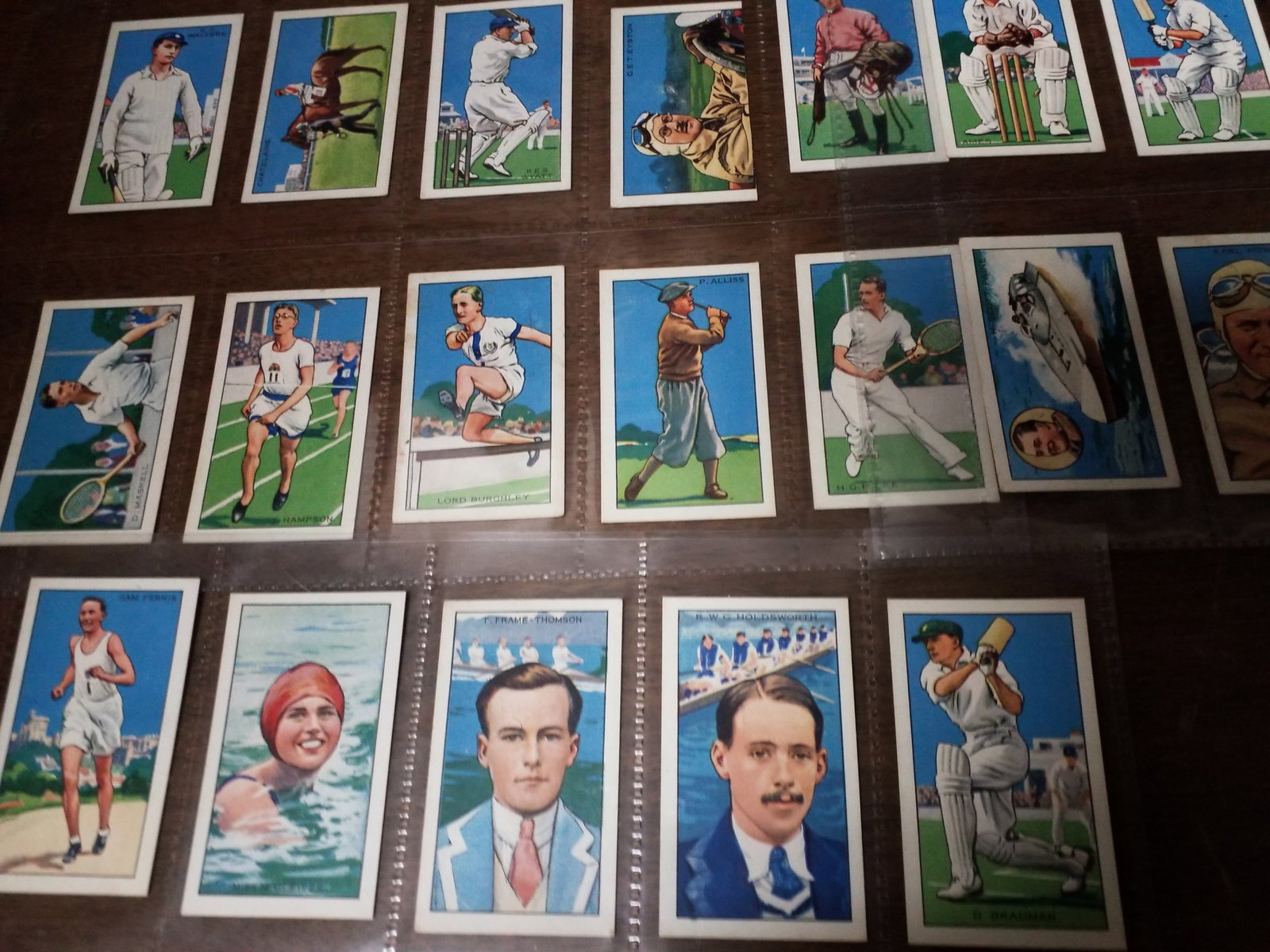 1935 Champions Gallaher Tobacco Cards lot of 27 Cigarette cards part set: A nice collection of early tobacco cards, A portion of the set, in sheeted protectors, many other tobacco cards being added daily to our sale. Please view pictures.