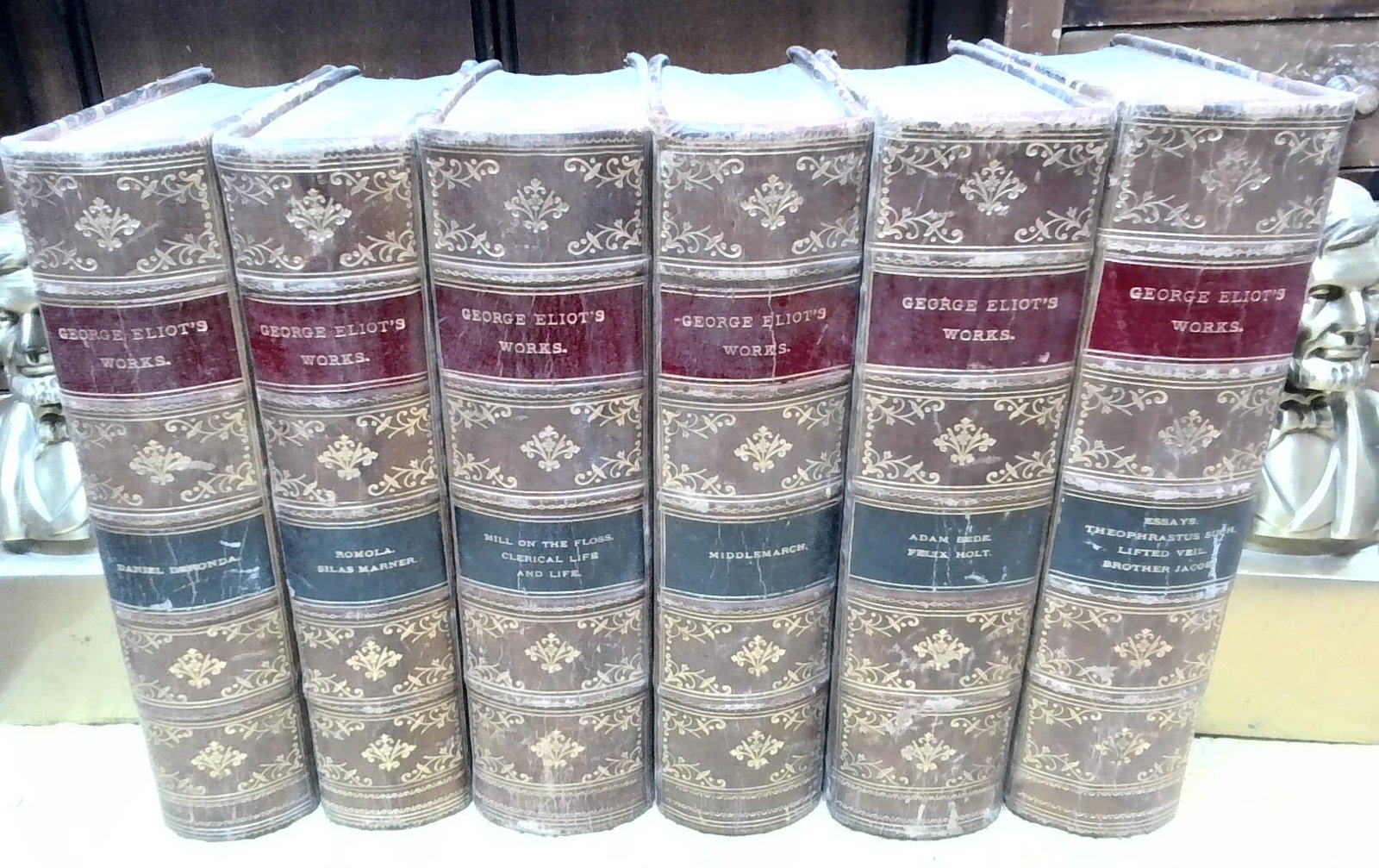 George Eliot's Complete Works 6 volumes set Illstrd James B. Lyon and Co. 1888 Bindings Illustrated: complete set. This collection was published by James Lyon NY. In 1888. Illustrated 6 volumes, attractive, with some wear but overall these 1/4 leather vols are doing well , marble boards, A nice colle