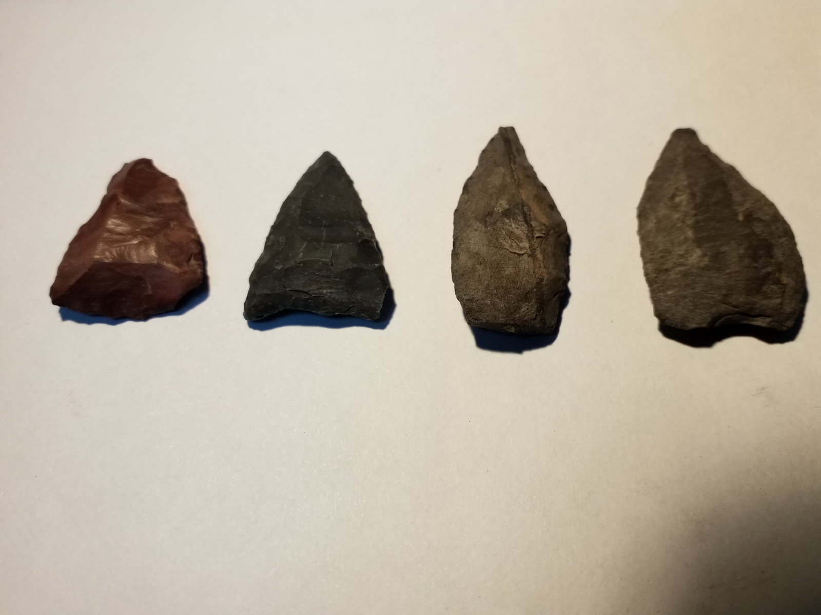An Exquisite authentic Collection of 5 small Native American Indian Heads: Most likely from the Northeastern Part of the United States. Very nice collection.