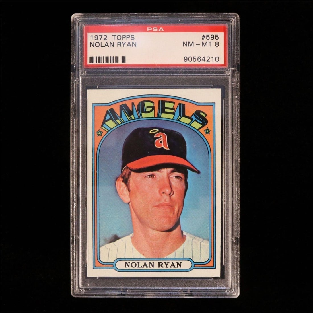 1972 Topps #595 Nolan Ryan (PSA 8 NM-MT): 1972 Topps #595 Nolan Ryan (PSA 8 NM-MT) MLB Baseball Trading Card (PSA Certification: 90564210). A standout example of one of the most iconic cards of the 1970s. High-grade copies of this issue are e