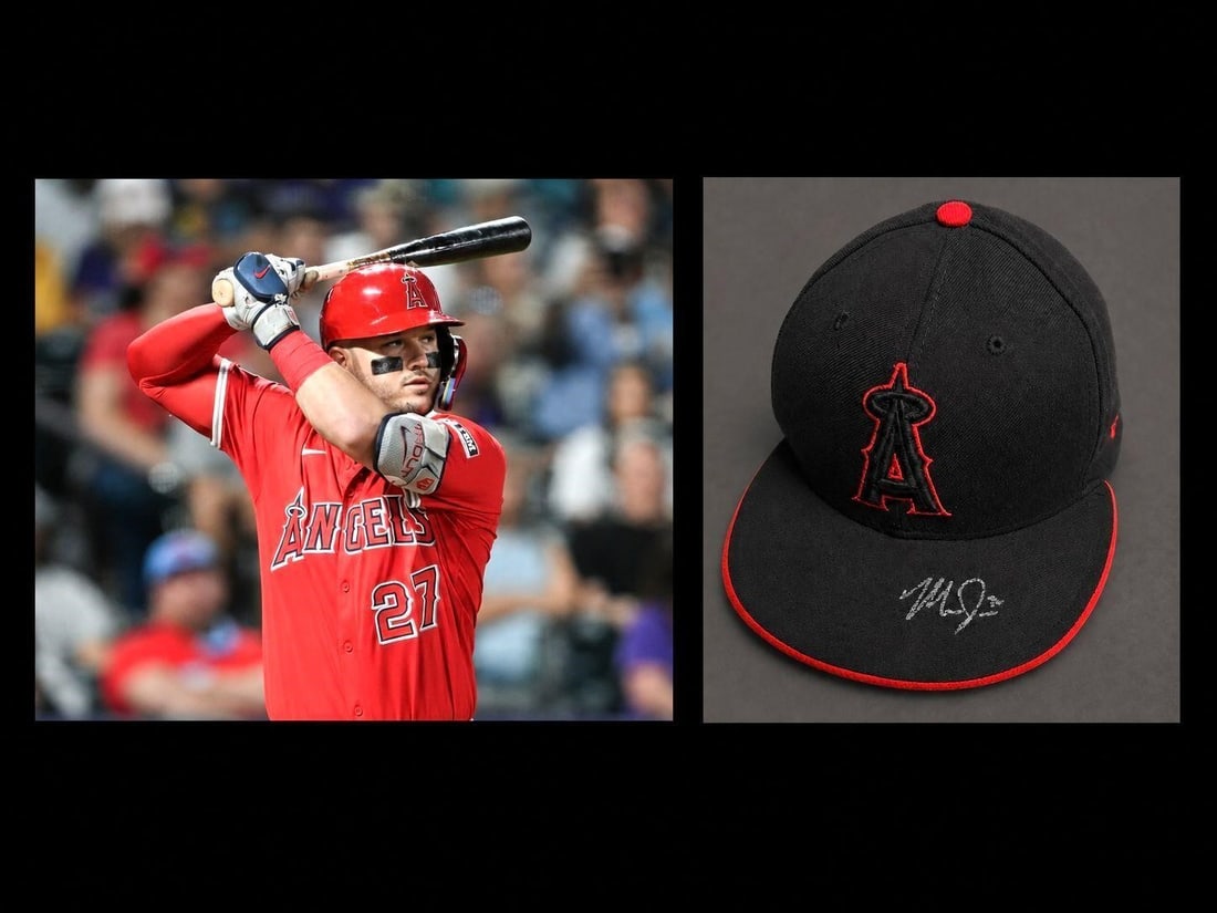 Mike Trout Signed Los Angeles Angels MLB Hat: Mike Trout Autographed Los Angeles Angels MLB Fitted Baseball Hat (Size 7 3/4 - 62CM). A Mike Trout autographed Los Angeles Angels fitted baseball hat, beautifully signed in silver paint pen across th