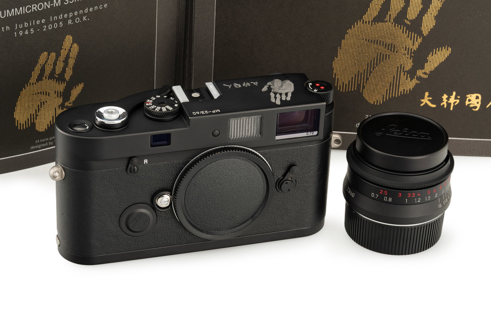 Leica MP 10322 '60th jubilee of korean independence': Year:2005 Sn:3027133 A special edition Leica MP, numbered 23/60, issued in 2005 to commemorate the 60th anniversary of Korean independence. The black body, with the serial number 3027133, features a s