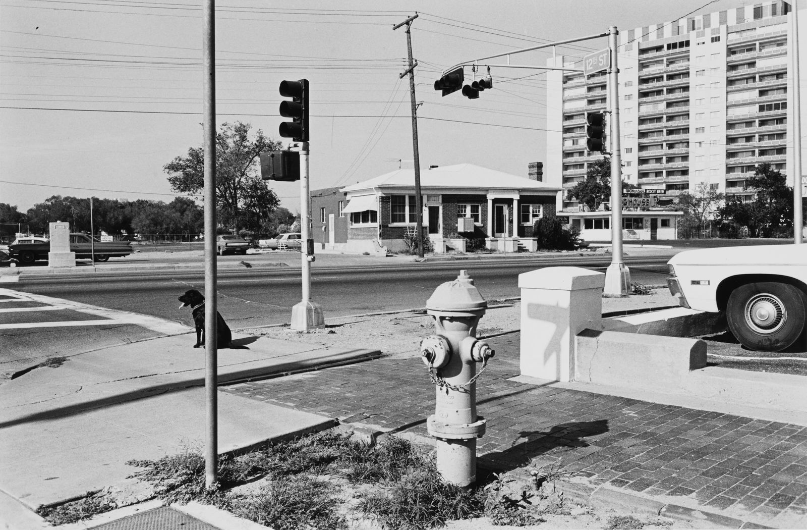 Albuquerque: Size:28.5 * 18.5 cm Aritist:Lee Friedlander Shooting Year:1972 Medium:Gelatin silver print Paper size:35.5 * 27.5 cm Photo size:28.5 * 18.5 cm Verso:Pencil signed and titled on the verso, with artist'