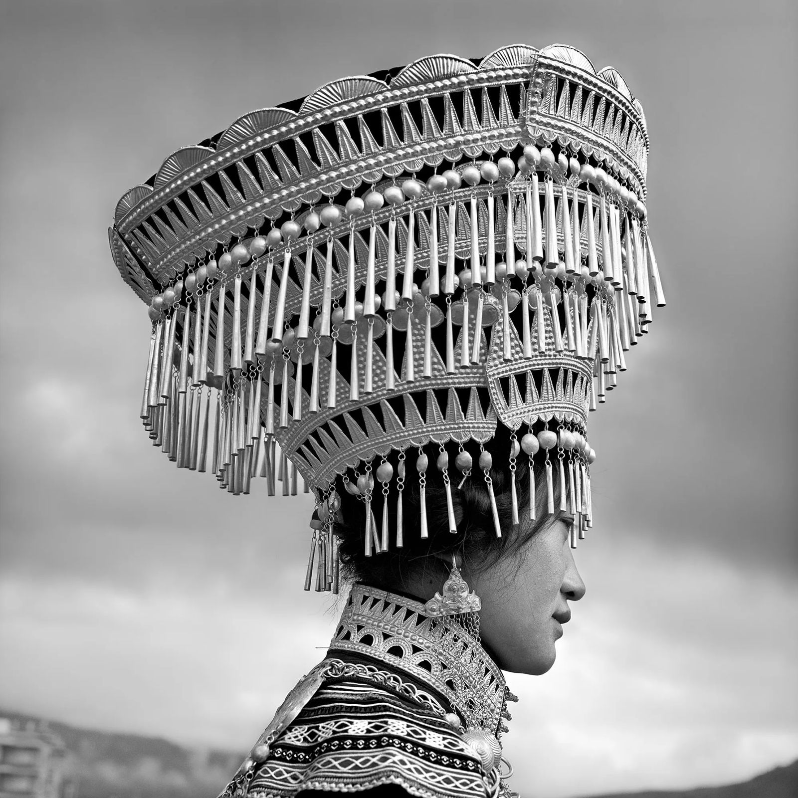 Yi Woman Wearing a Headdress: Creation Date: 2014 Location: Butuo County, Daliang Mountains, China Medium: Mulberry Bark Paper(Intangible Cultural Heritage) Technique: Epson fine art giclee print Edition: 1/10 Mounting: Teak frame