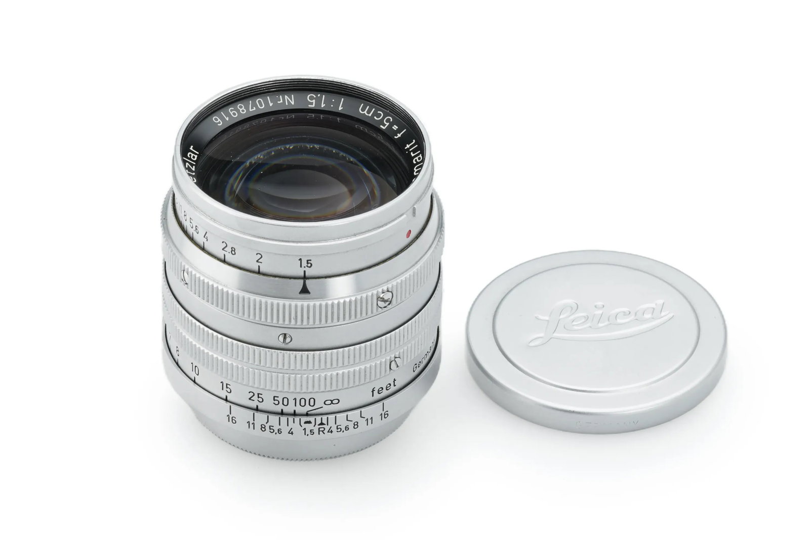 Leica Summarit 1.5/5cm: This beautiful Summarit lens featuring clear optics and no cleaning marks. Accompanied by both lens caps.